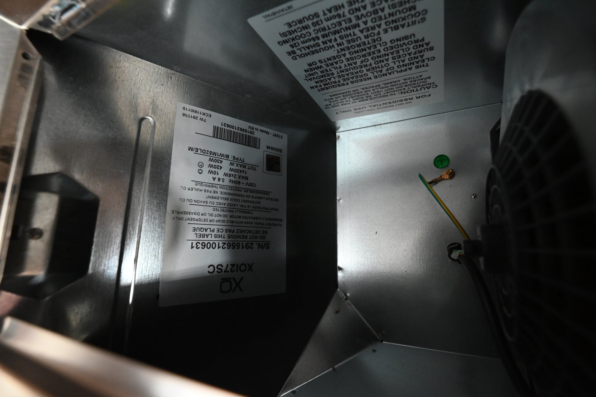 XO custom range hood insert with LED lighting and code compliance control