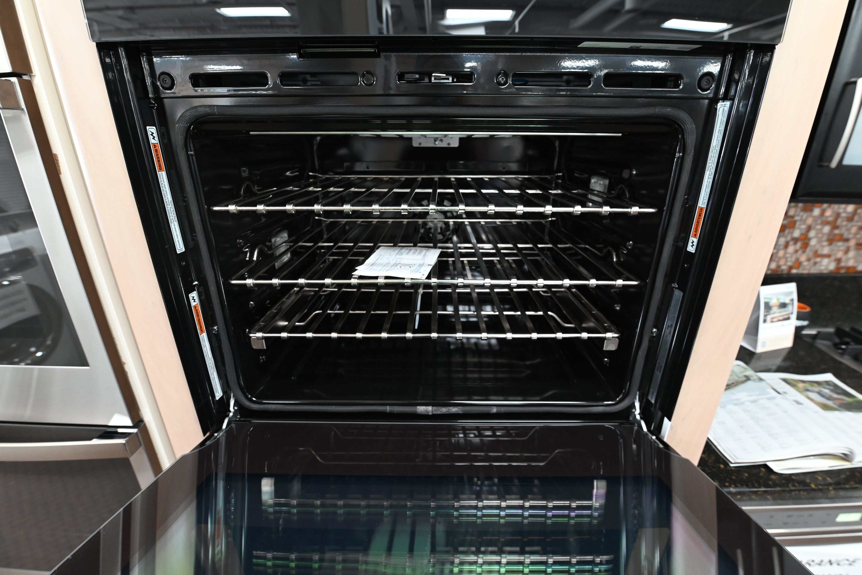 Luxury professional 30 inch double wall oven showing 4.3 inch full color LCD touchscreen control panel close up