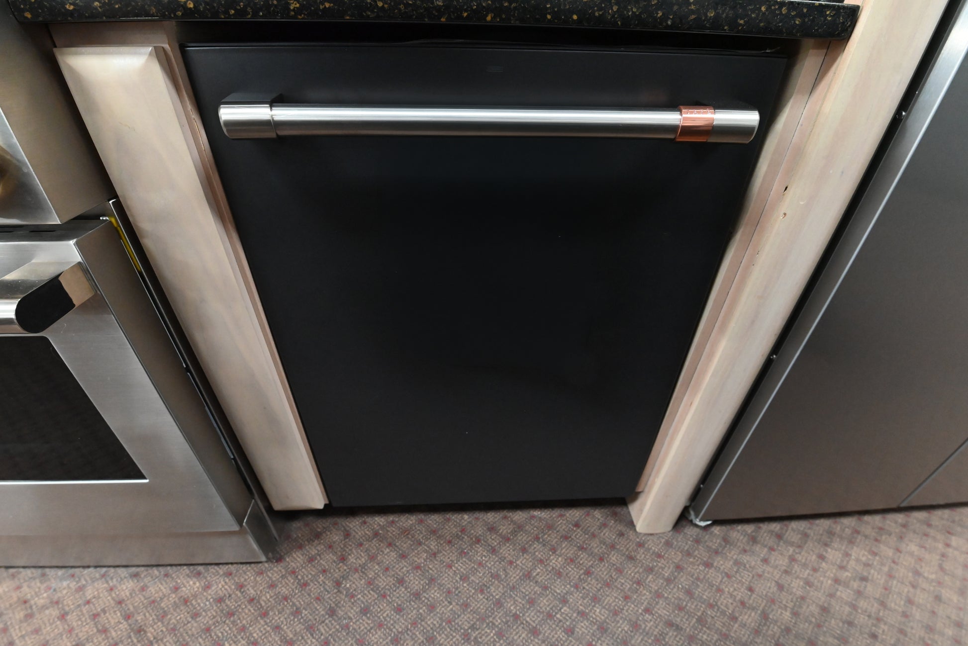 Cafe CDT845P3ND1 24 inch built in hidden control dishwasher front view in matte black