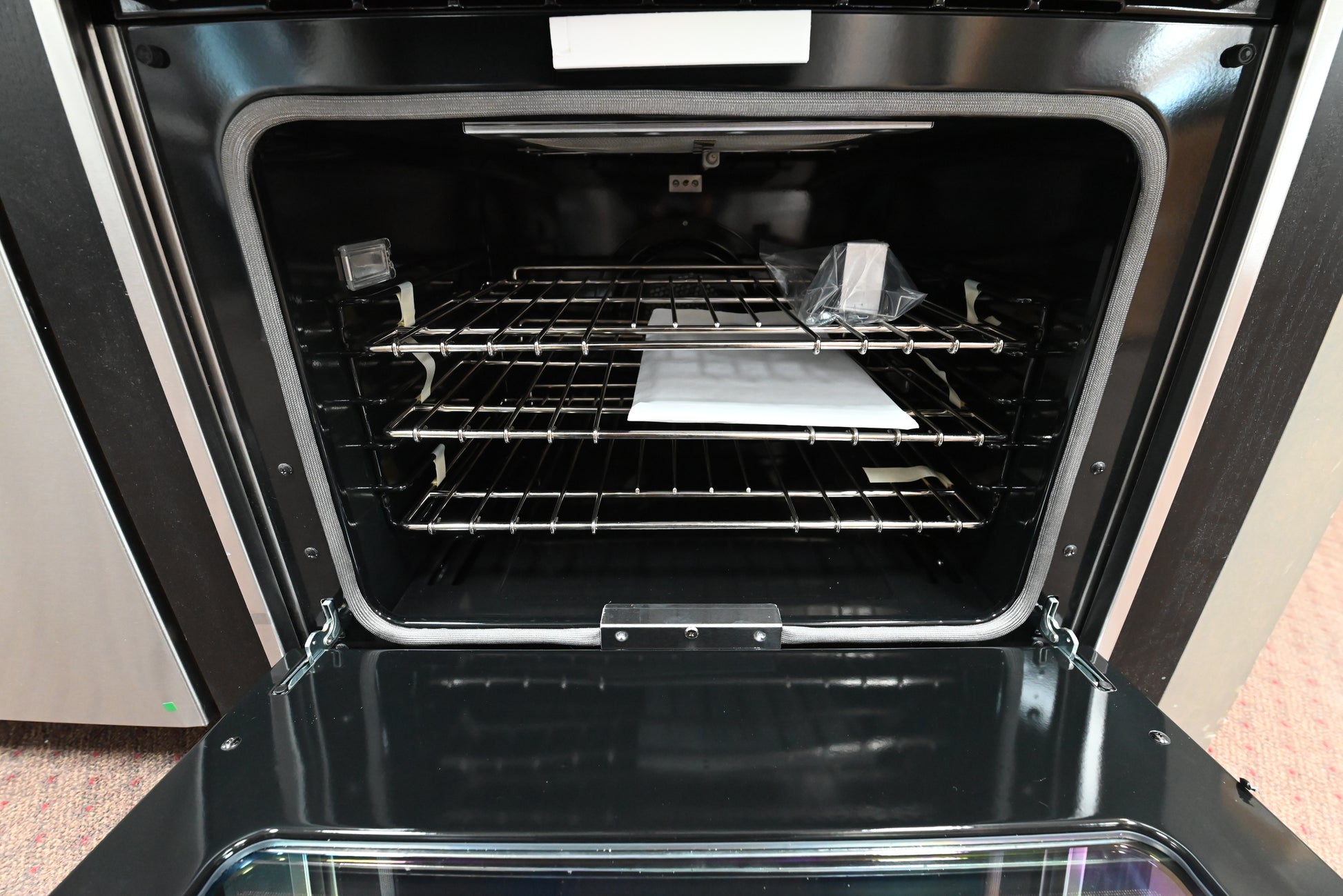 Viking 30 professional range showing full width removable grease drip pan tray extended