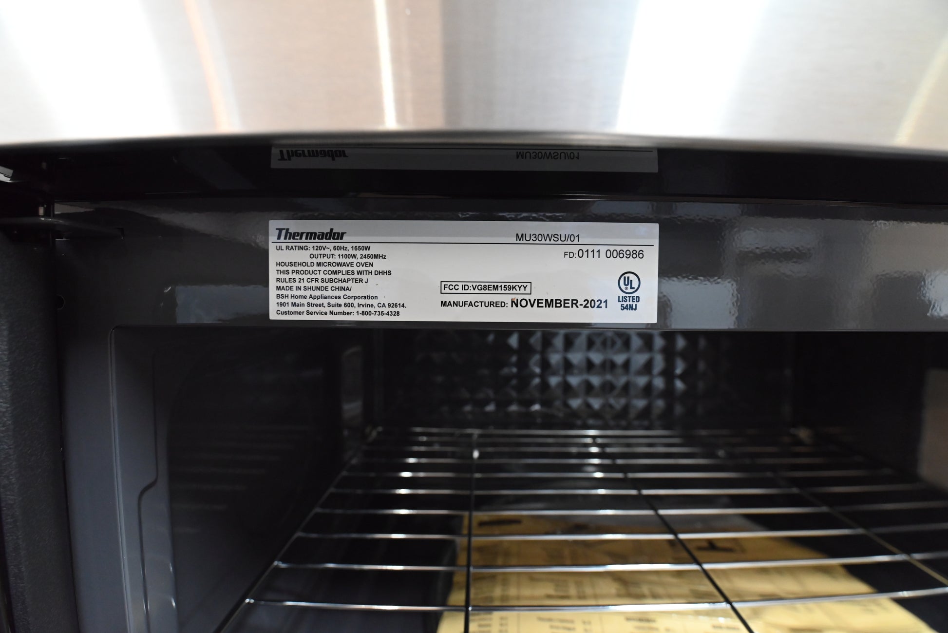 Thermador 30 microwave base view showing down firing range lighting and ventilation filters