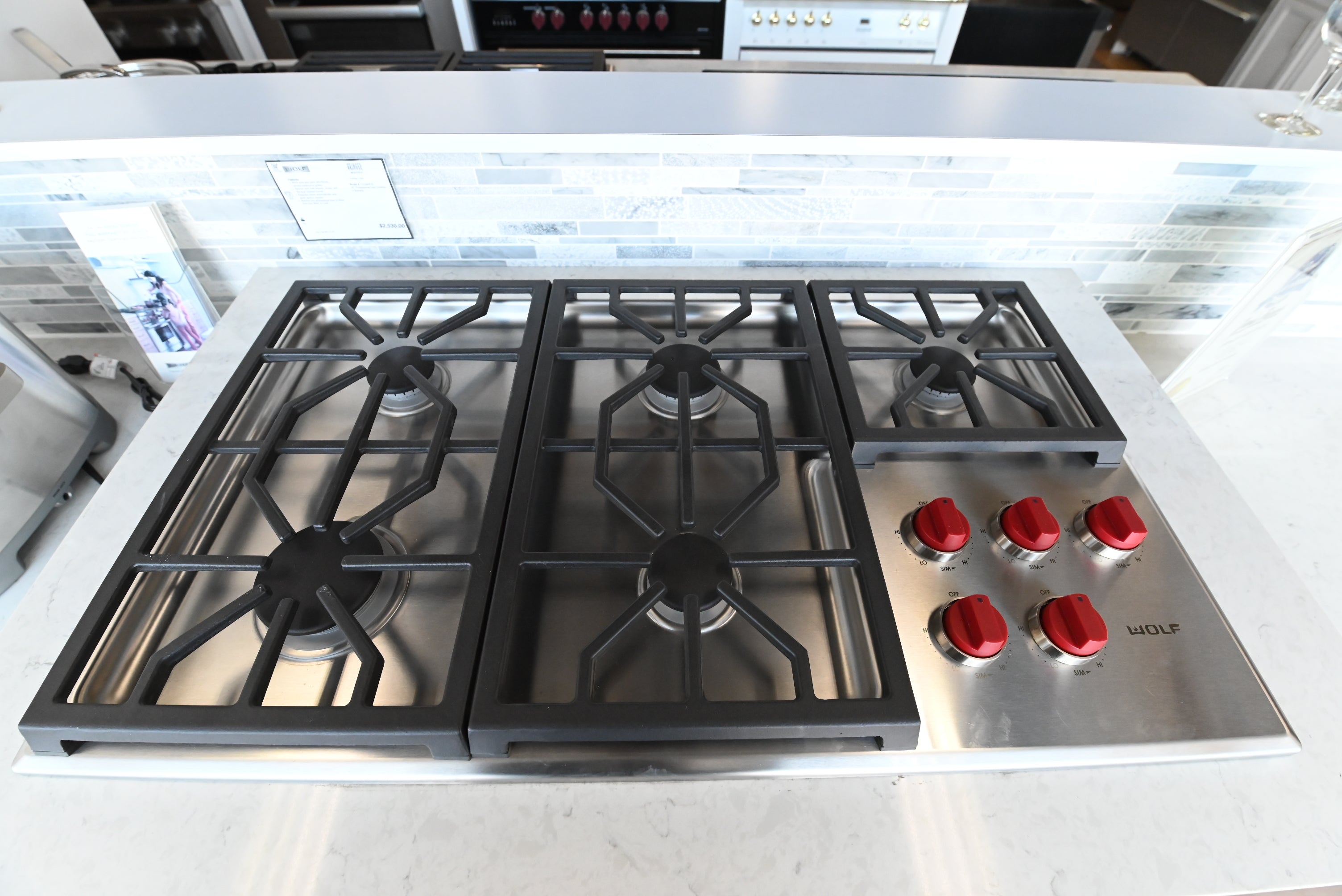 Luxury 36 inch drop in gas cooktop with 5 dual stacked sealed burners by Wolf