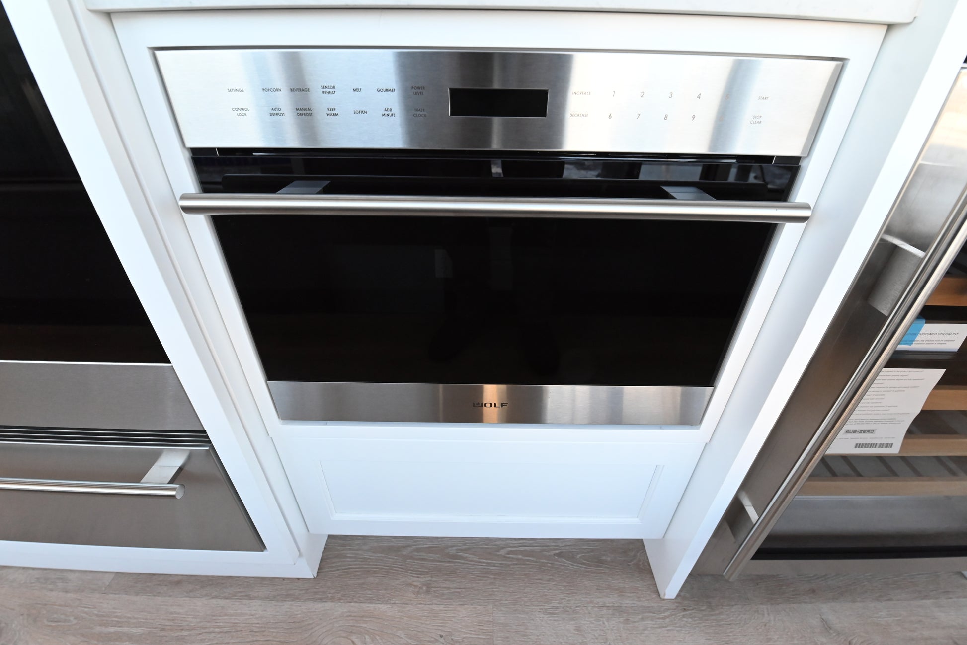 Wolf MDD2450TE/S 24 inch transitional stainless steel undercounter microwave drawer front view