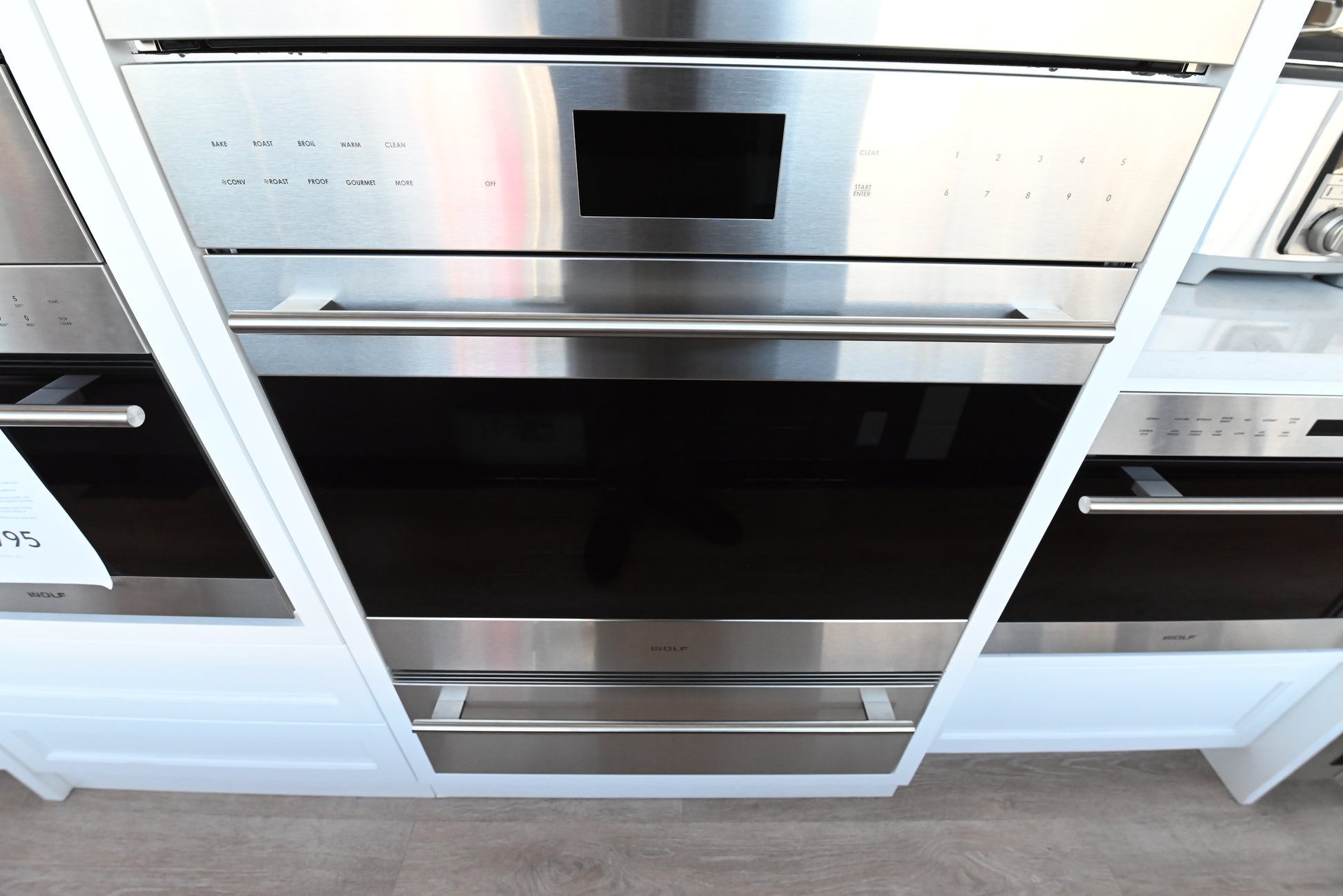 Wolf SO3050TE S TH 30 inch transitional single built in M series wall oven front view with tubular handle