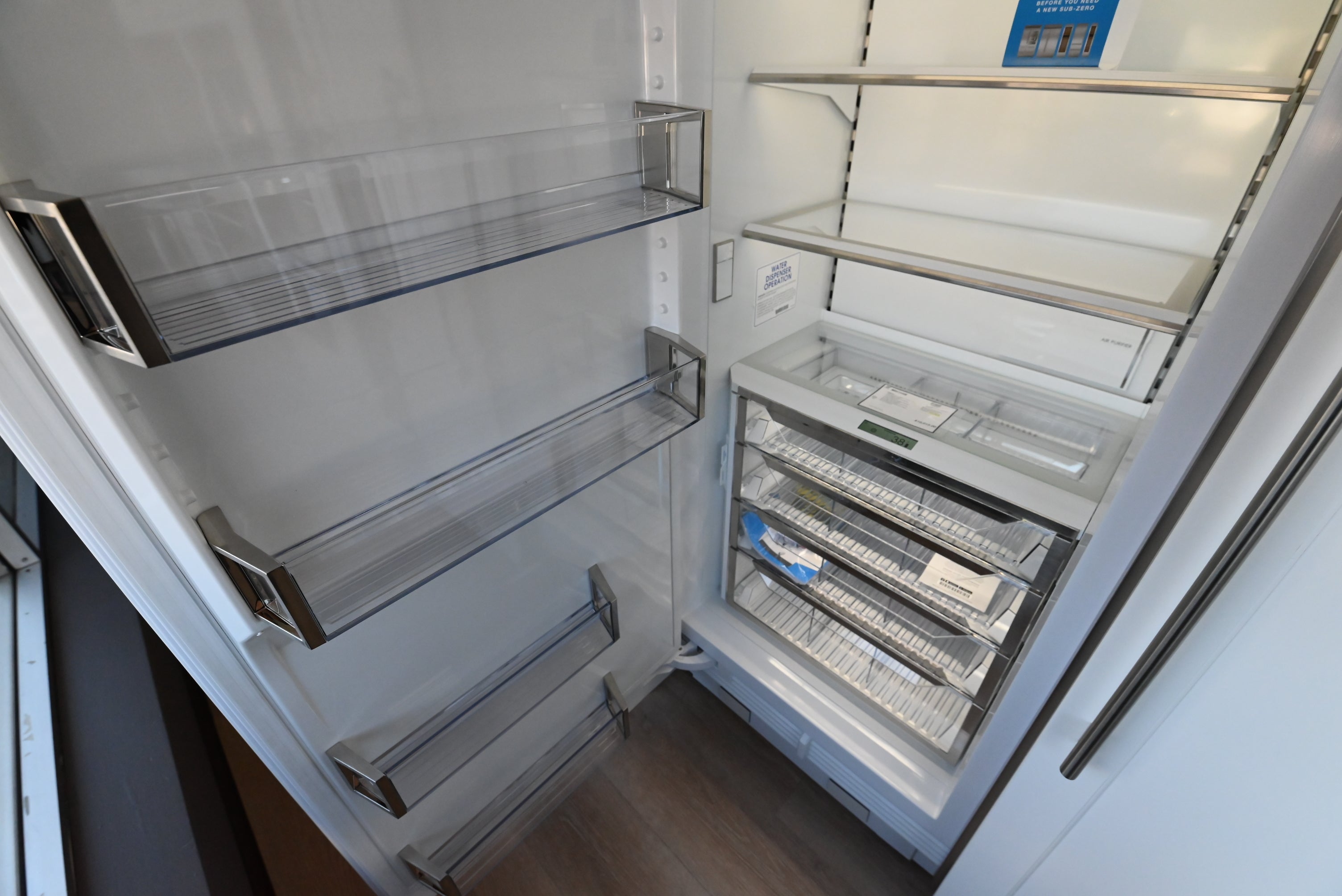 Luxury 30 inch built in designer refrigerator column with internal water dispenser by Sub Zero