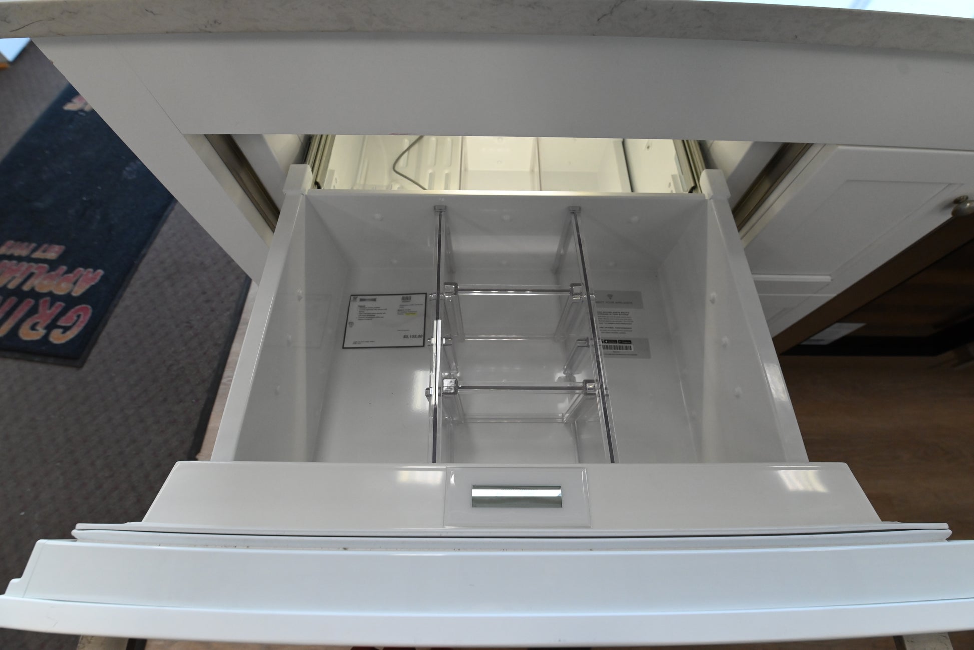 uxury 30 inch integrated double drawer undercounter fridge with custom panels by Sub Zero
