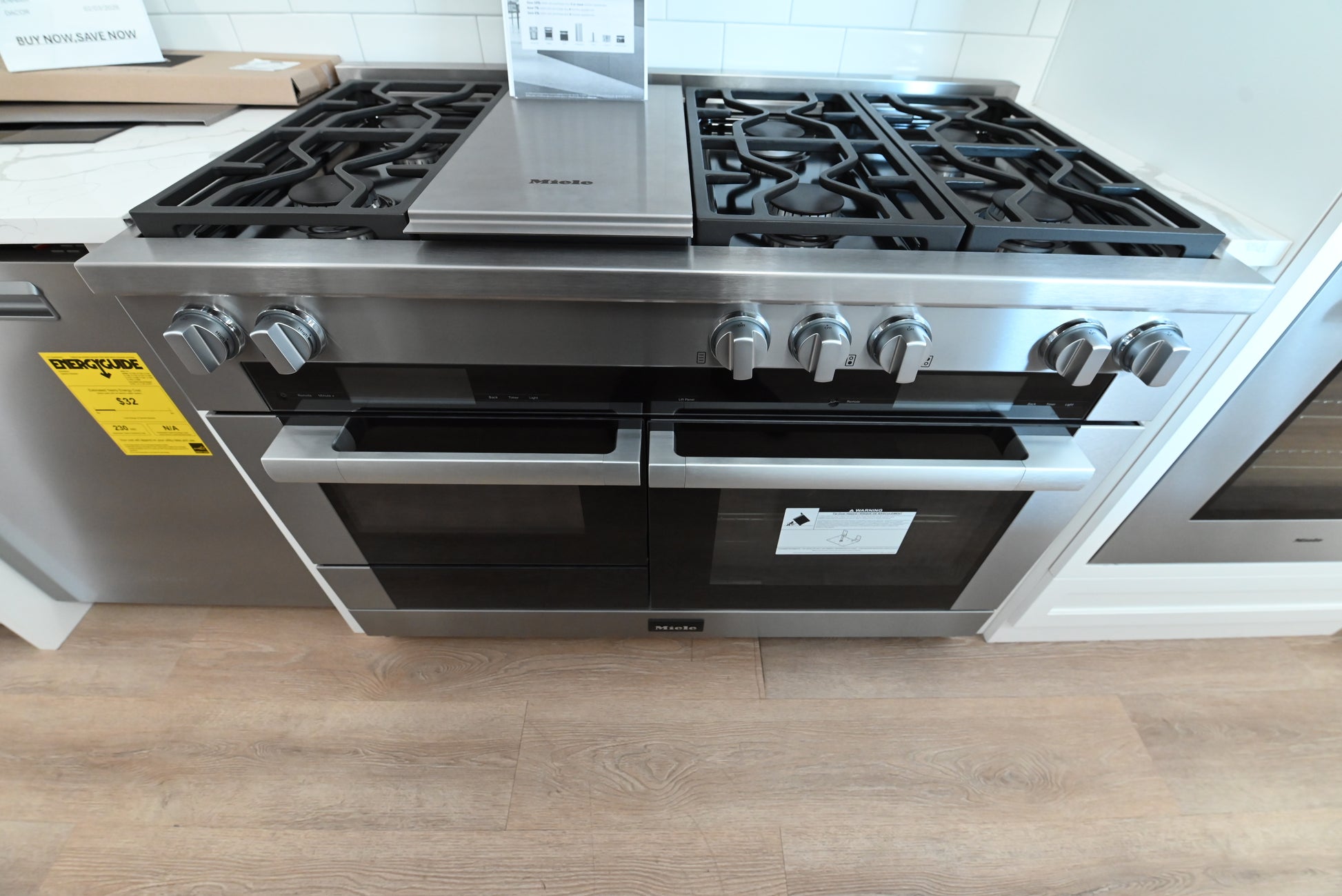 Luxury 48 inch professional freestanding range with gas burners griddle and speed oven by Miele
