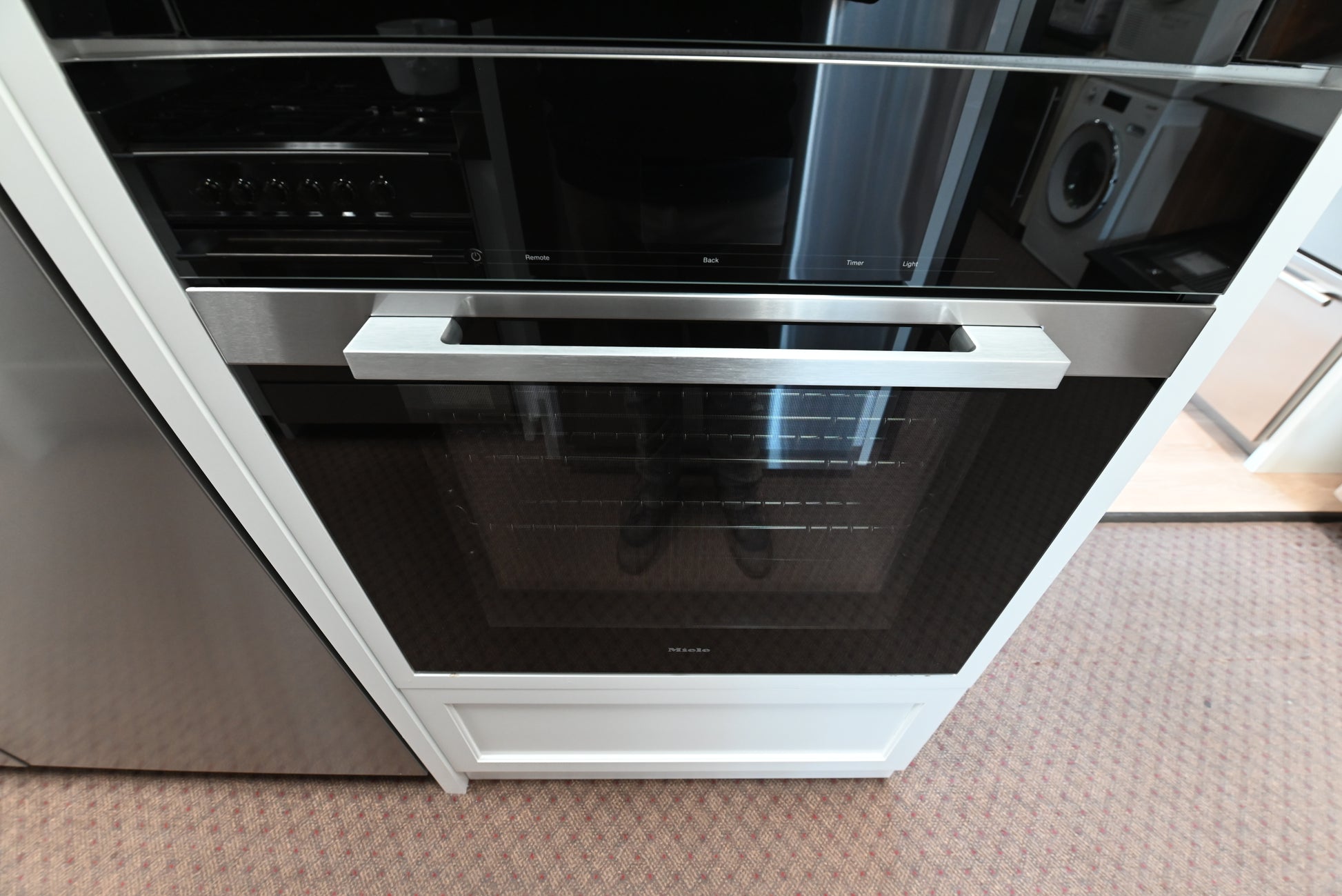 Miele H 7680 BP 30 inch built in convection wall oven front view in clean touch steel