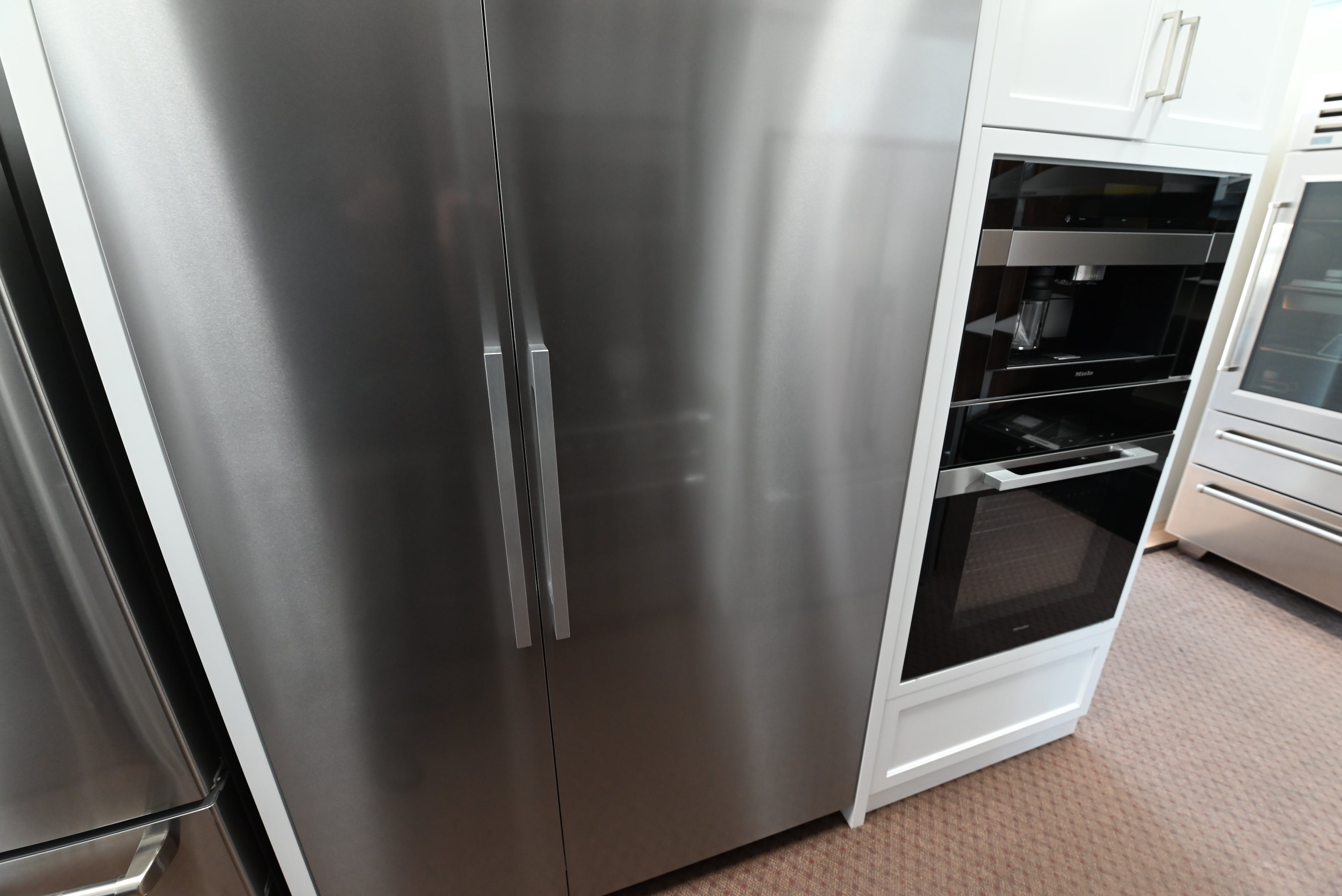 Luxury 30 inch built in panel ready refrigerator column with push to open door by Miele