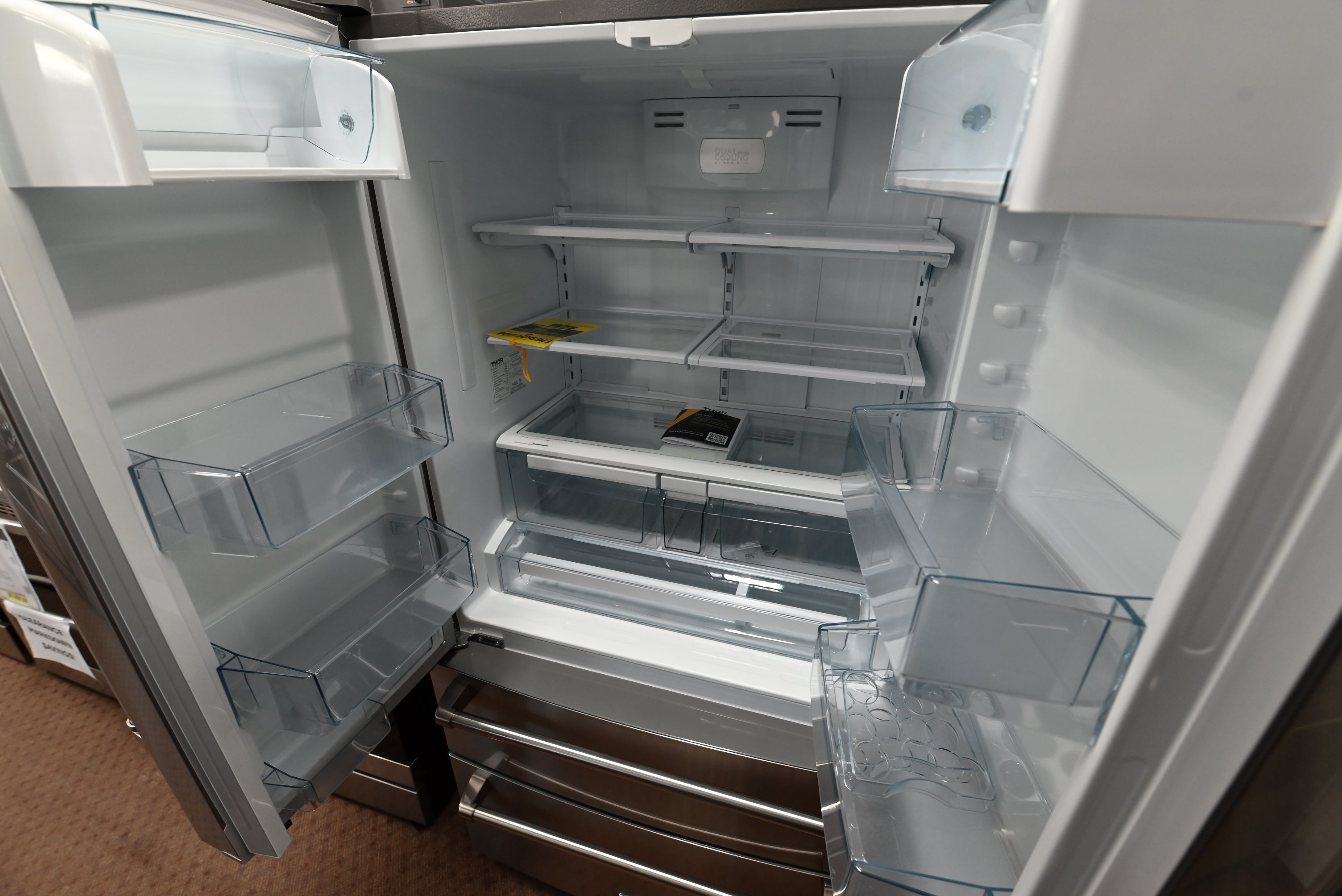 Thor Kitchen 36 refrigerator showing double freezer drawers pulled out with ice maker
