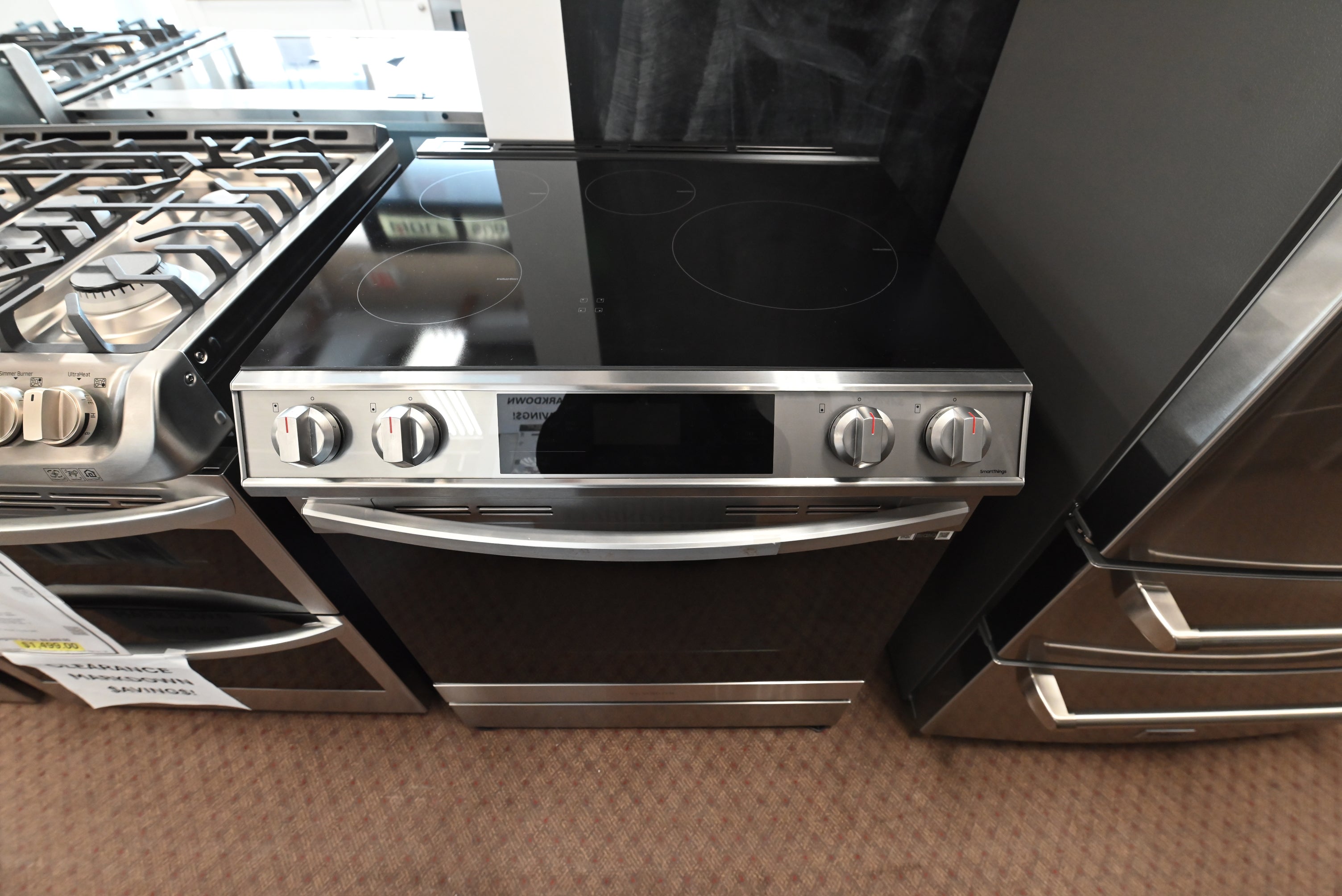 Close up of Samsung Bespoke induction cooktop elements and front control panel