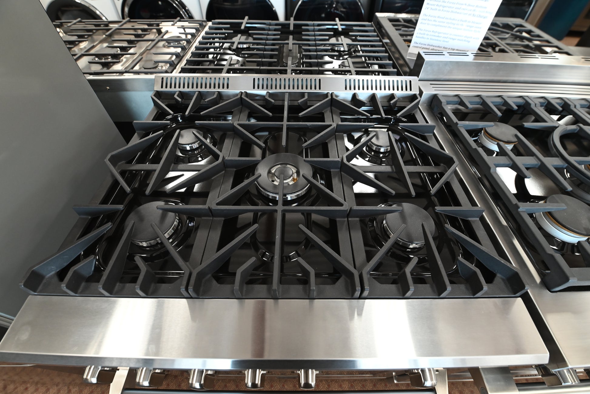 Close up of Forno gas range control panel and professional oven handle