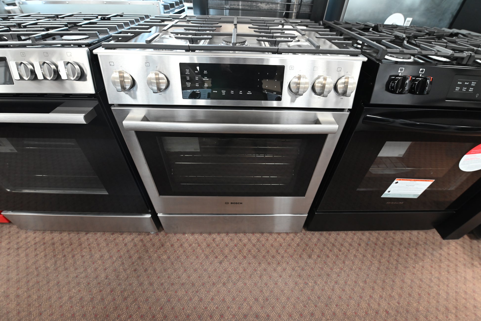 Bosch HDI8056U 800 Series 30 inch slide in dual fuel range front view stainless steel
