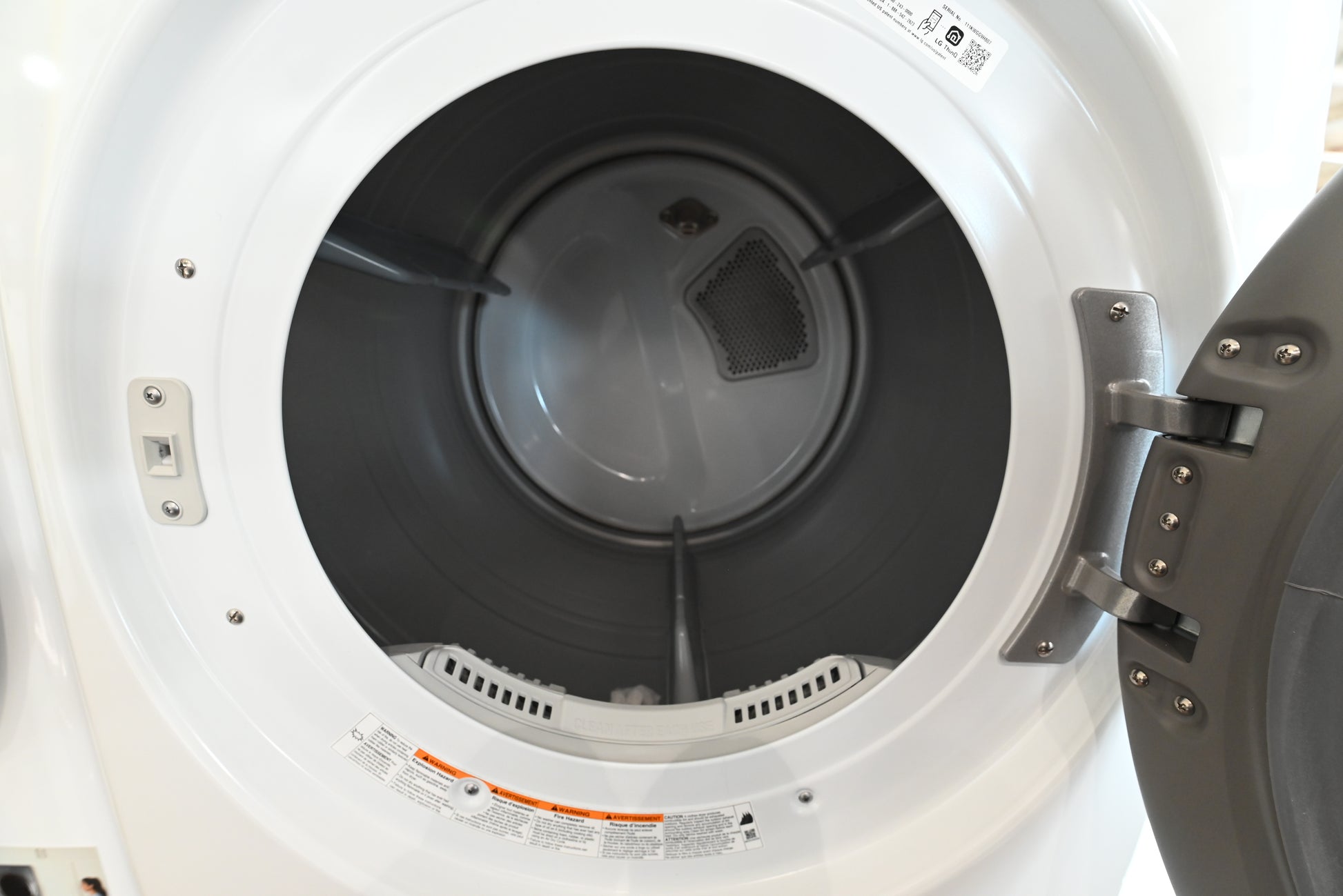 LG 24 smart dryer showing front centered Dial-A-Cycle knob and digital LED control layout screen