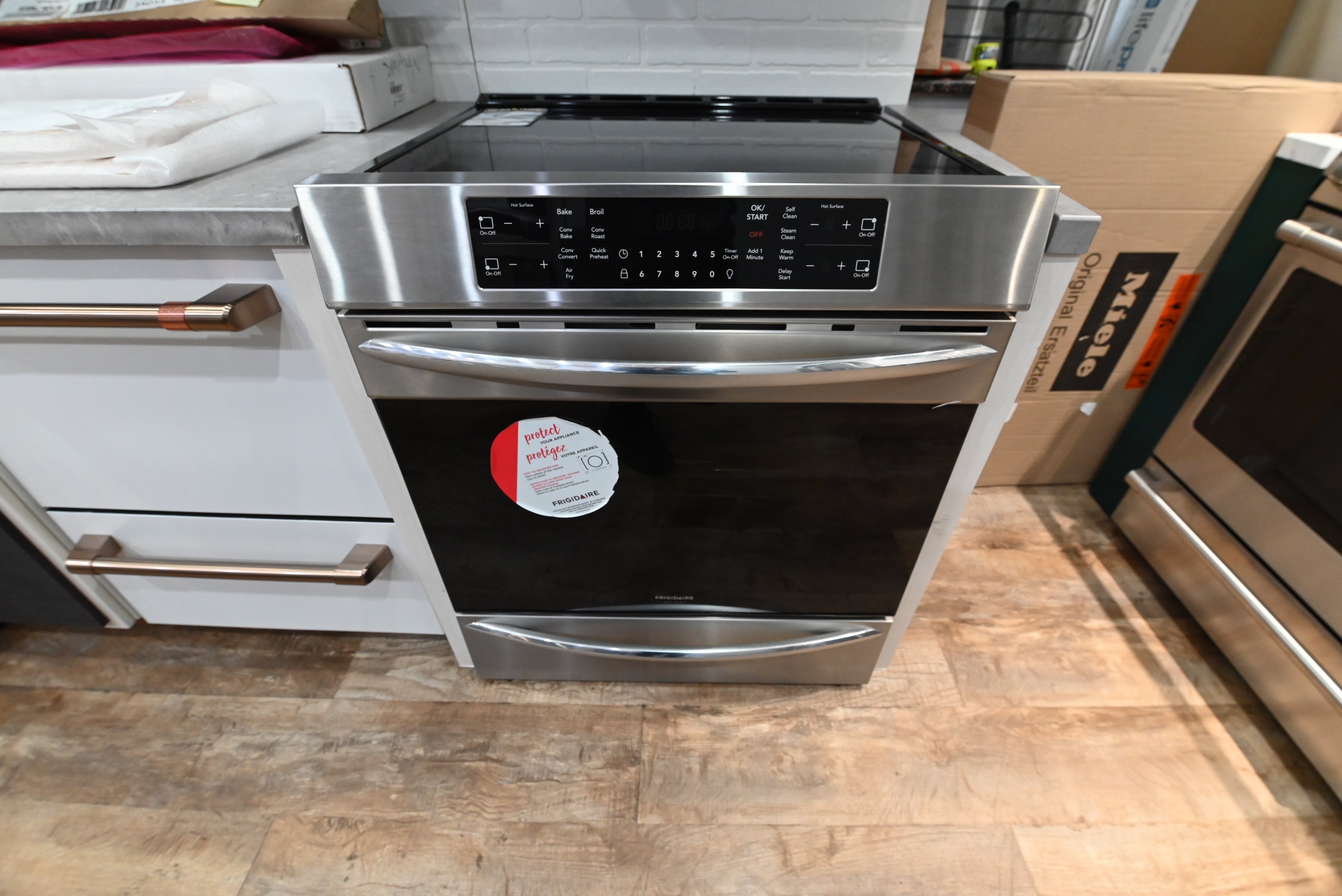 Frigidaire Gallery FGIH3047VF 30 inch front control induction range in smudge proof stainless steel straight front view