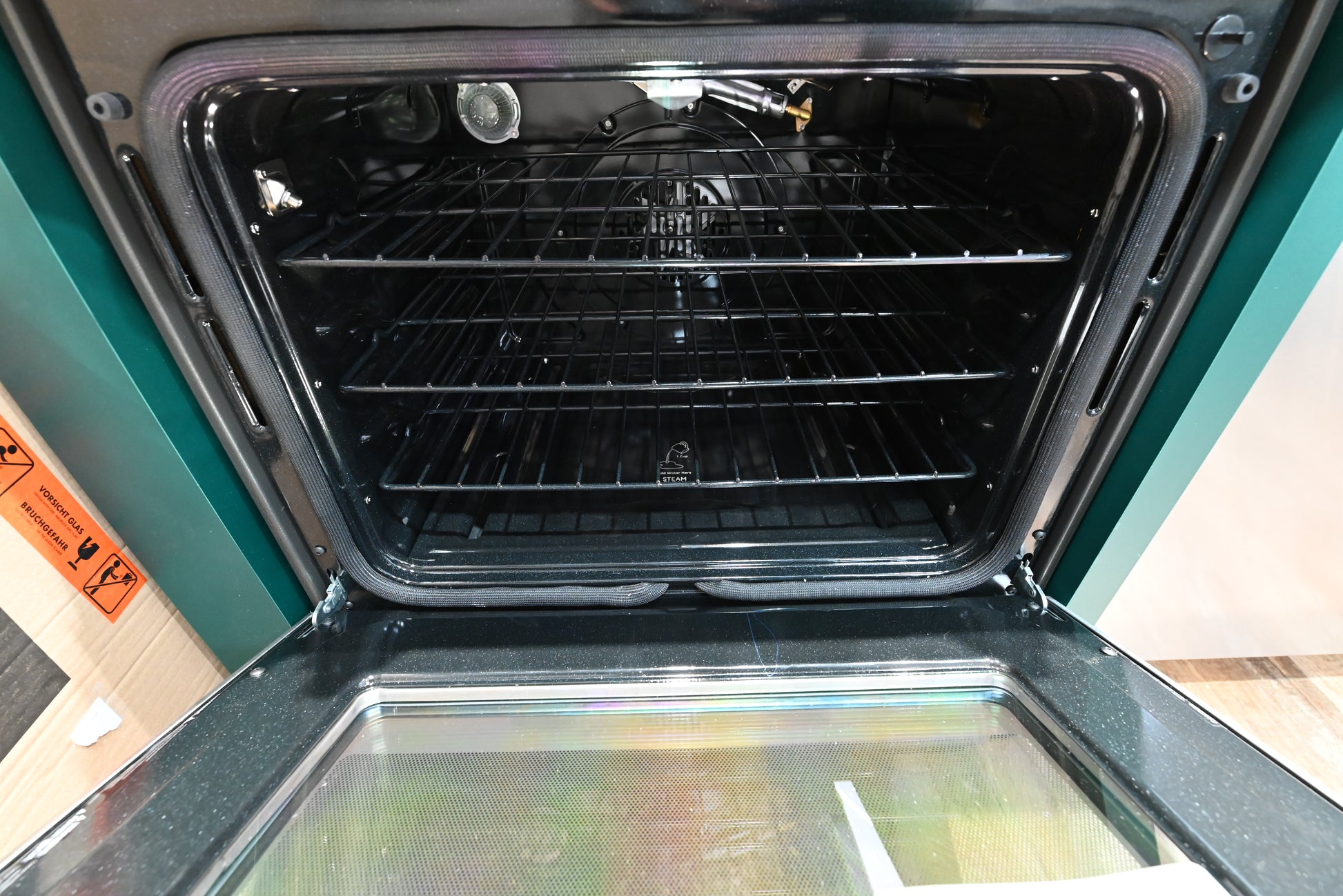 Luxury 30 inch gas range with 6 burners and integrated cast iron griddle by Cafe