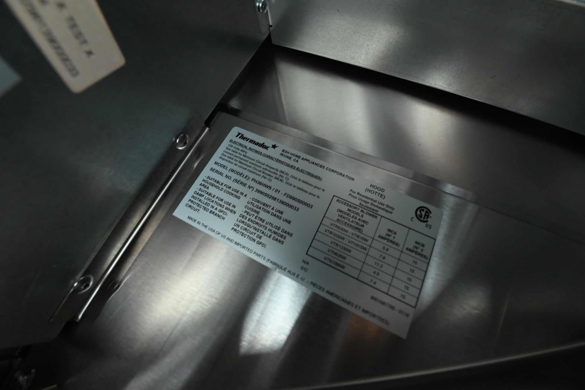 Thermador 36 professional wall hood close up showing front electronic touch controls and seamless corners