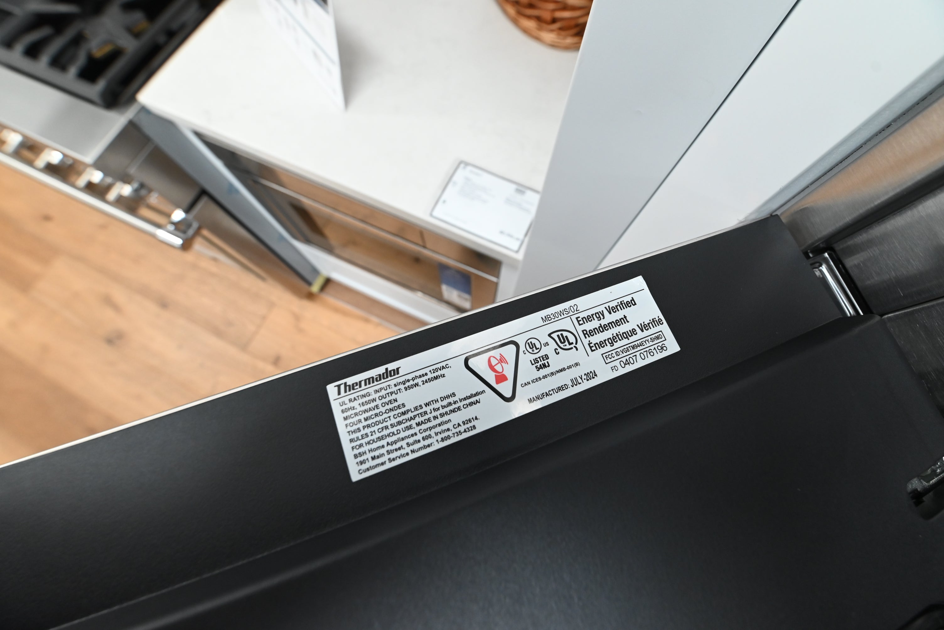Thermador 30 built in microwave showing color touchscreen control panel and gray glass finish