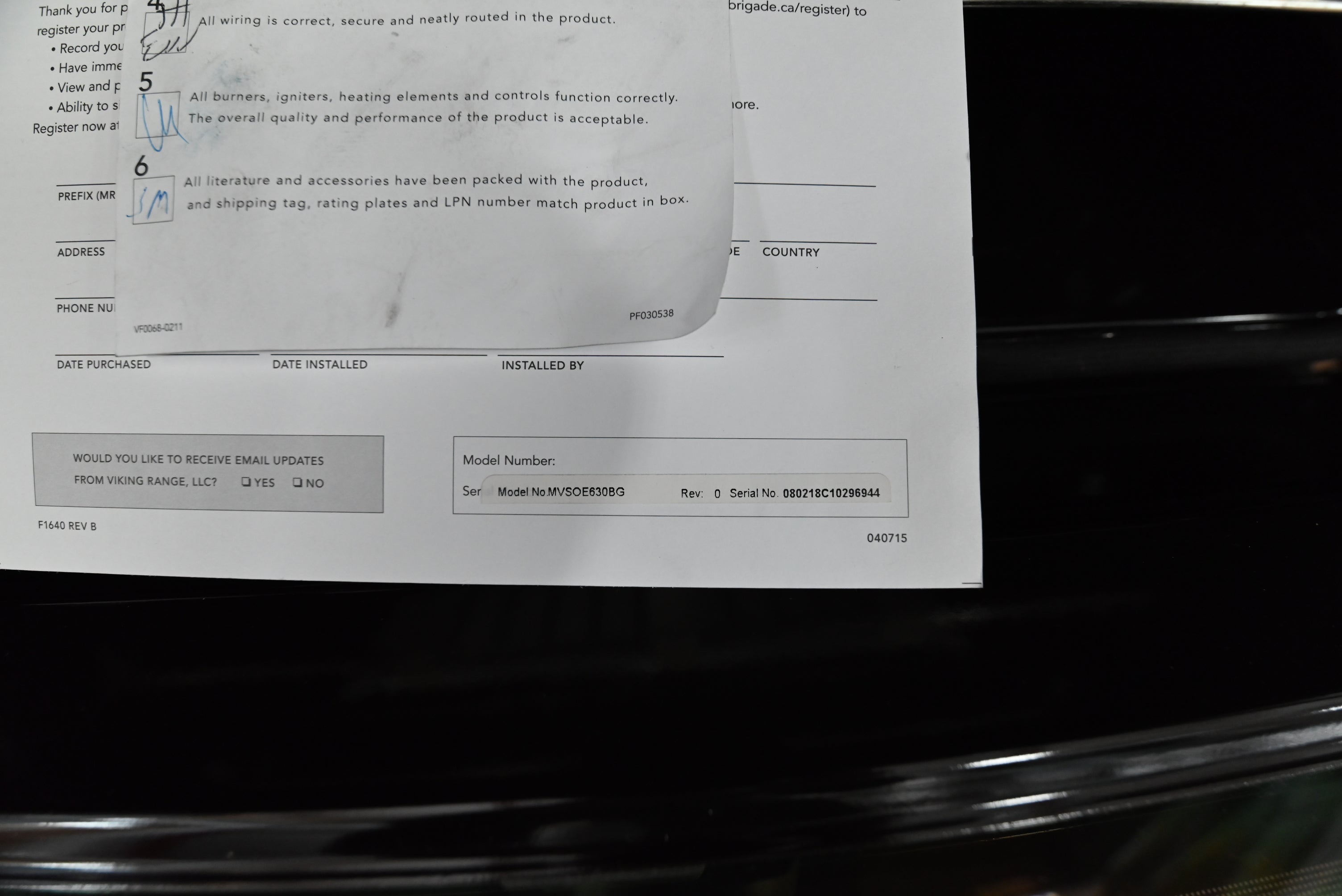 Viking 30 black glass transitional oven showing flush installation alignment in cabinetry