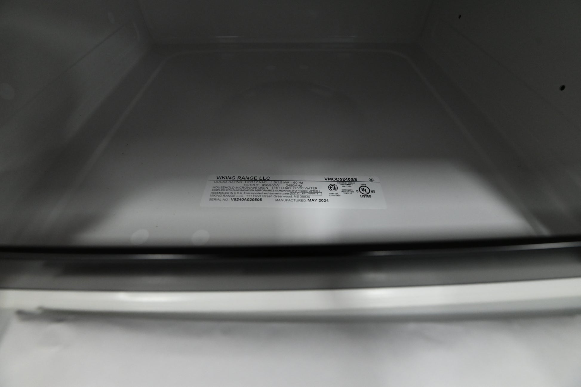 Luxury 24 inch kitchen island microwave drawer touch glided open showing 1.2 cu ft flat interior cavity