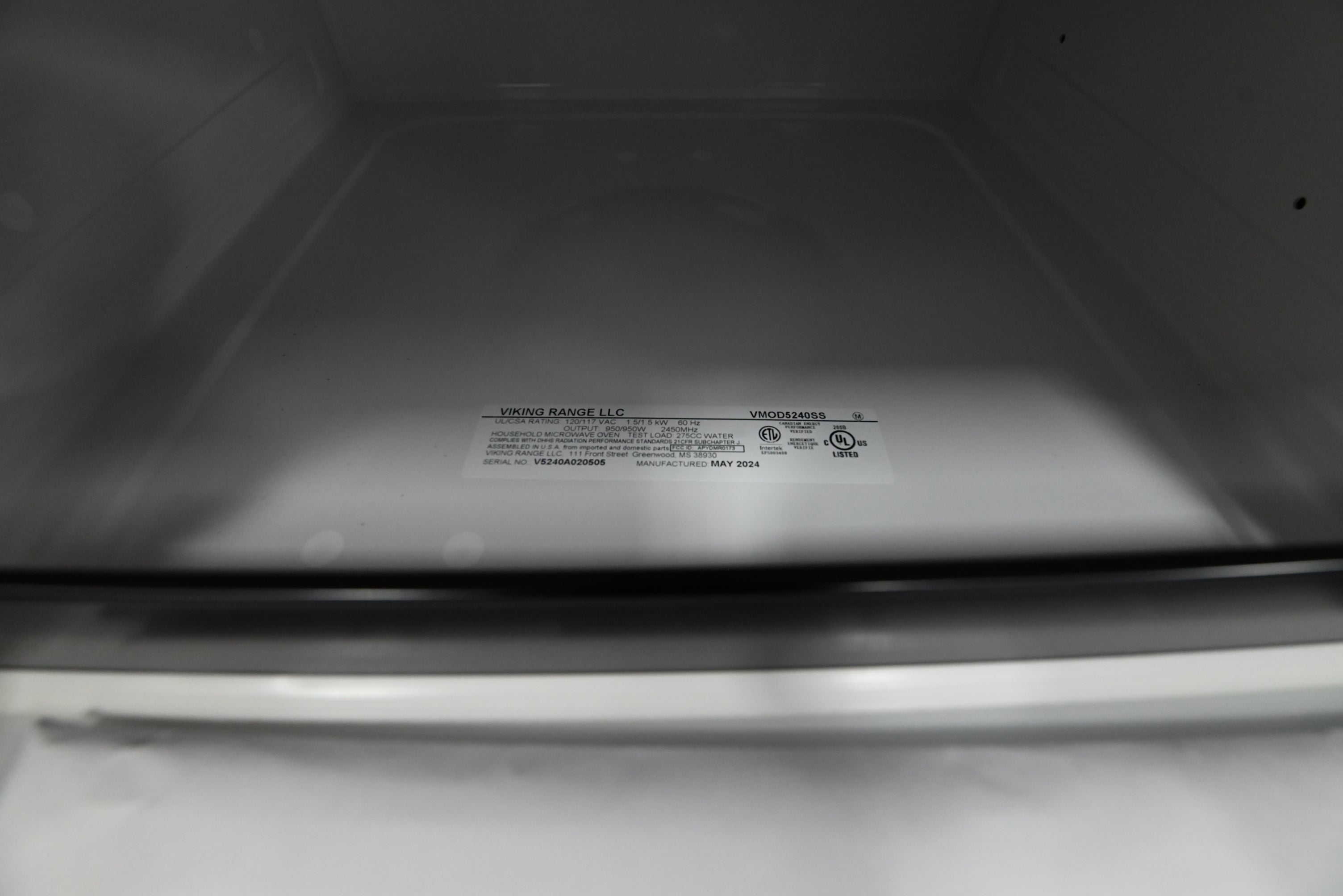 Luxury 24 inch kitchen island microwave drawer touch glided open showing 1.2 cu ft flat interior cavity
