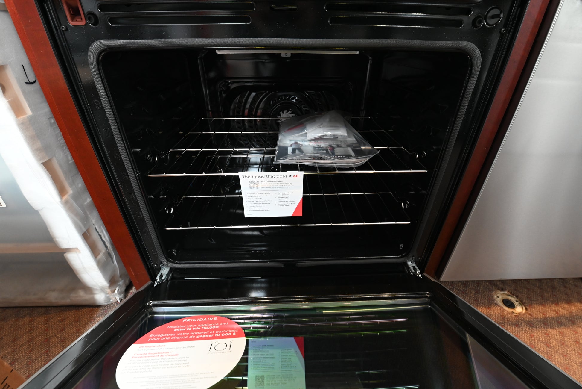 Luxury 30 inch electric cooktop showing 5 element radiant smooth black glass surface clean