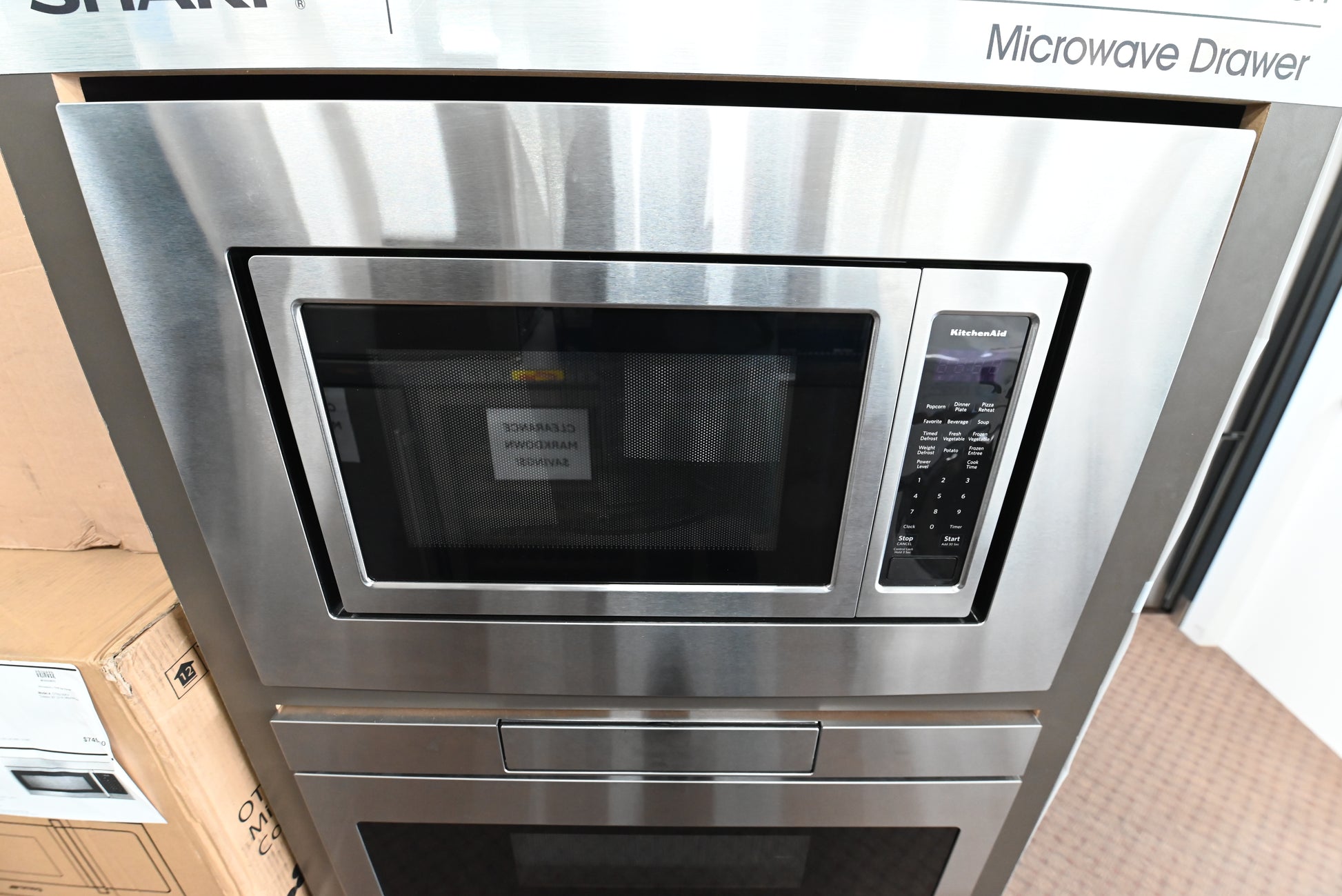KitchenAid KMCS1016GSS 22 inch countertop microwave oven in brushed stainless steel front view