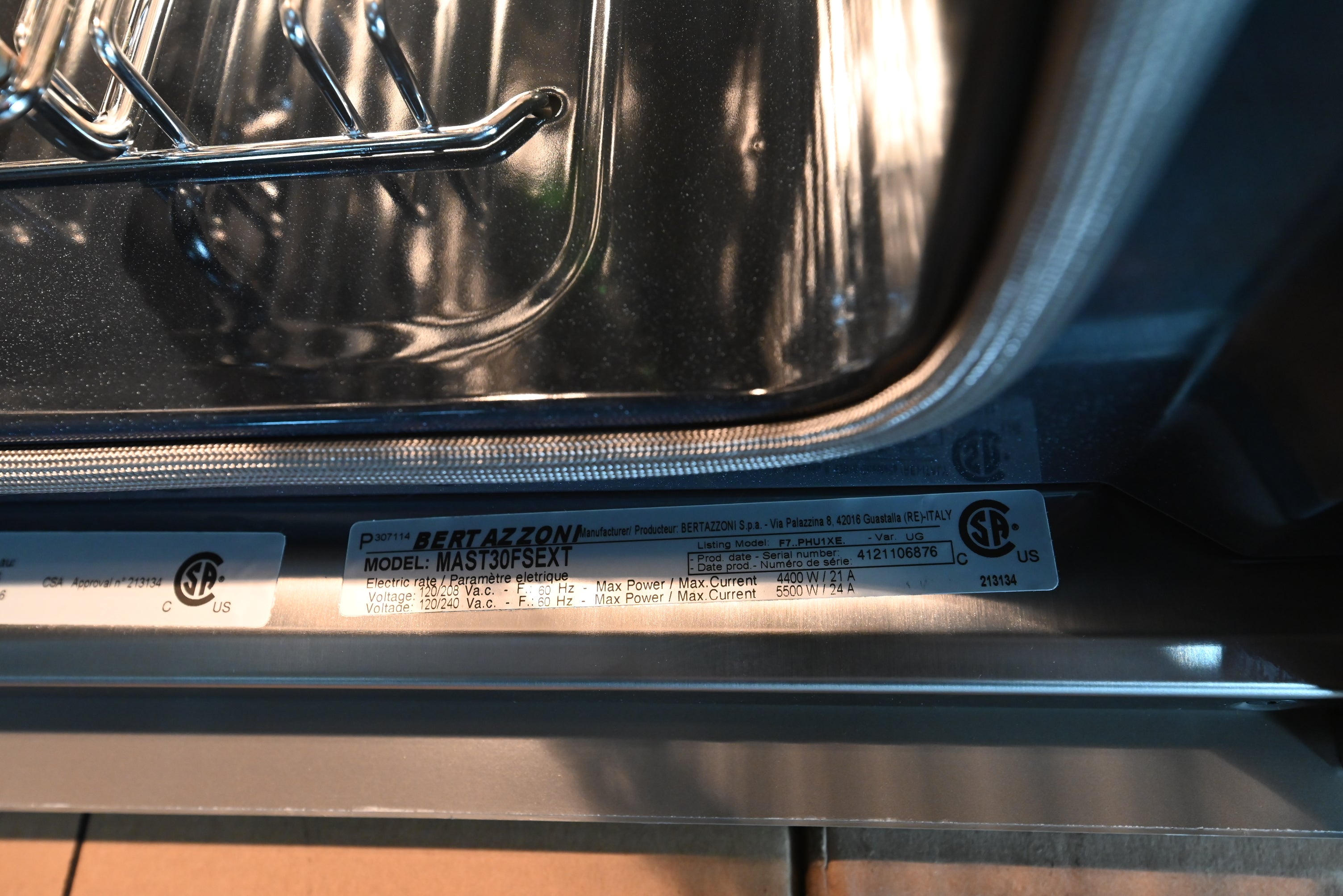 Bertazzoni Master Series single wall oven flush installed showing full color TFT touch display
