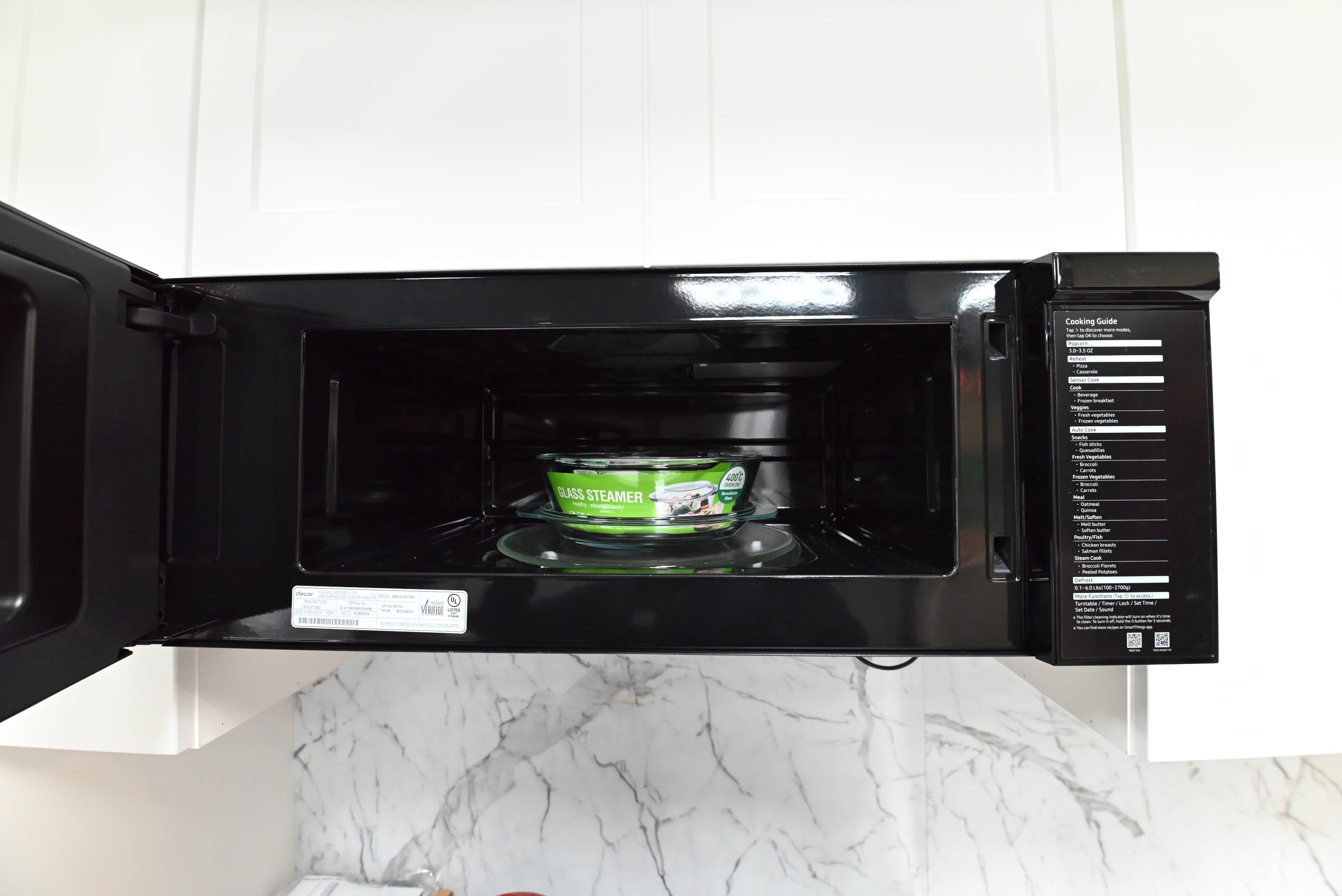 Luxury low profile 30 inch over the range microwave with integrated range hood vent filters by Dacor