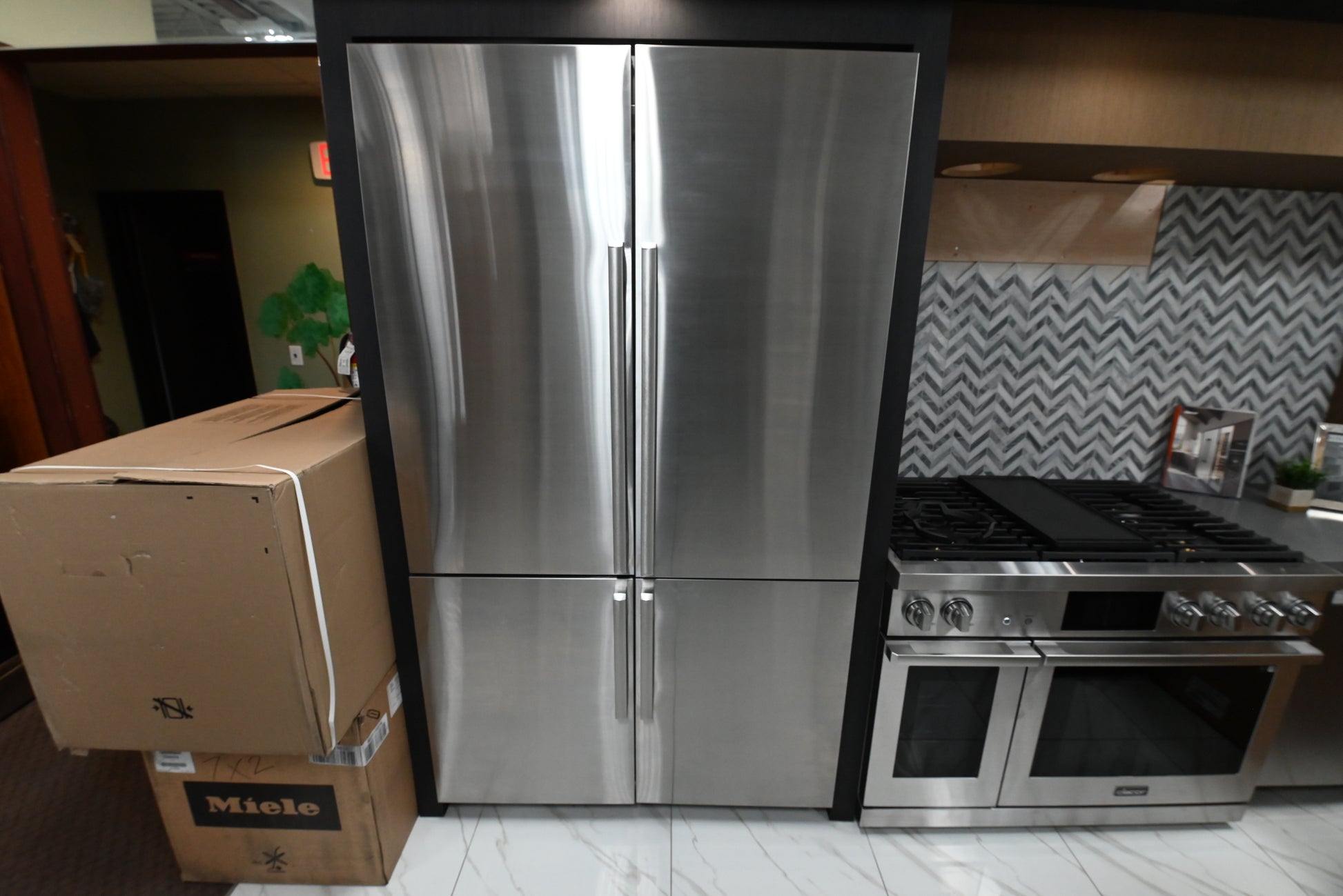 Dacor DRF487500AP 48 inch built in french door smart refrigerator front view with silver stainless panel kit