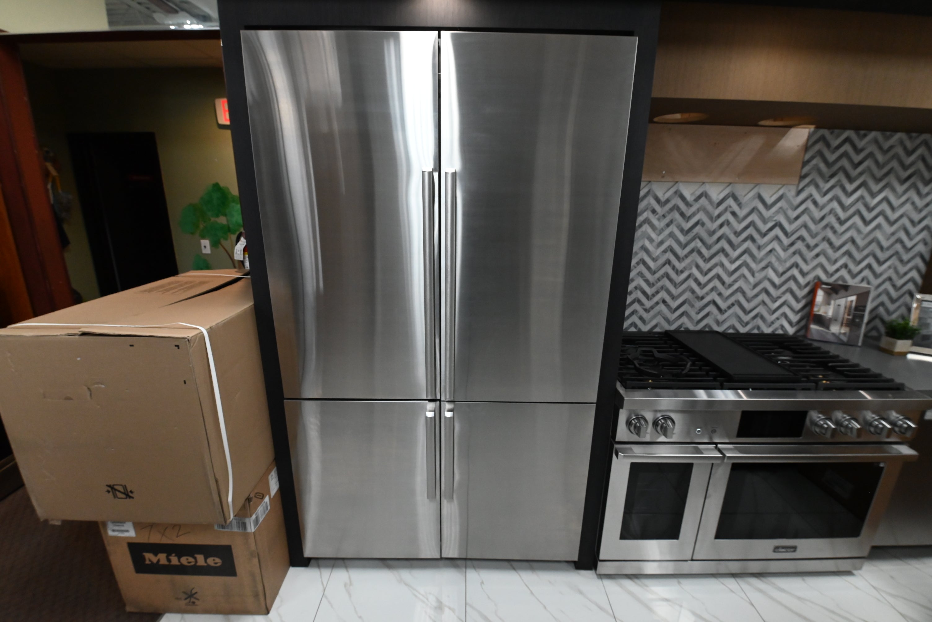 Dacor DRF487500AP 48 inch built in french door smart refrigerator front view with silver stainless panel kit