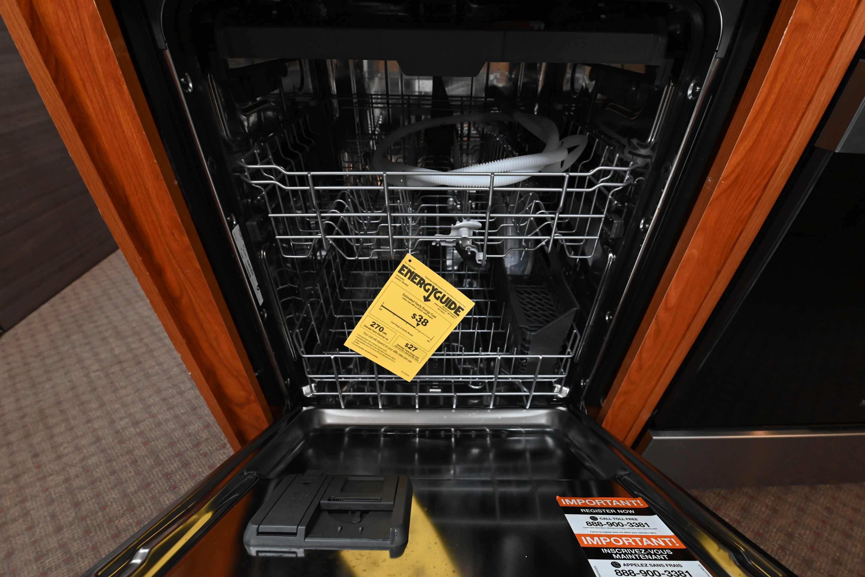 Interior view of stainless steel tub and 3rd rack in Whirlpool WDT750SAKZ dishwasher