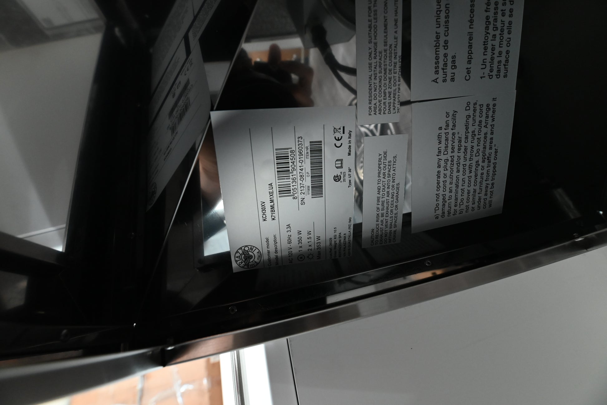 Bertazzoni stainless steel wall hood installed with height adjustable telescopic duct cover