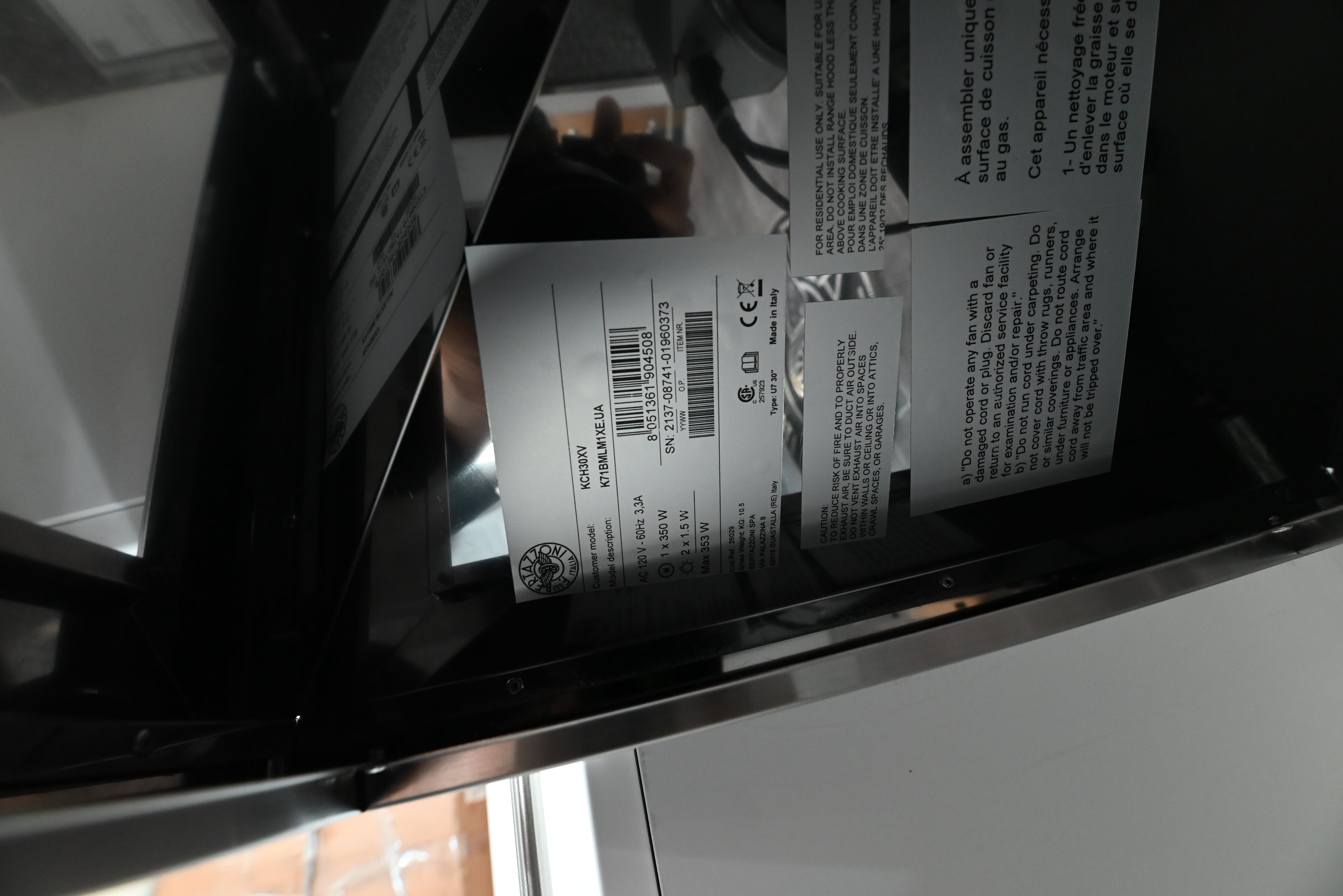 Bertazzoni stainless steel wall hood installed with height adjustable telescopic duct cover