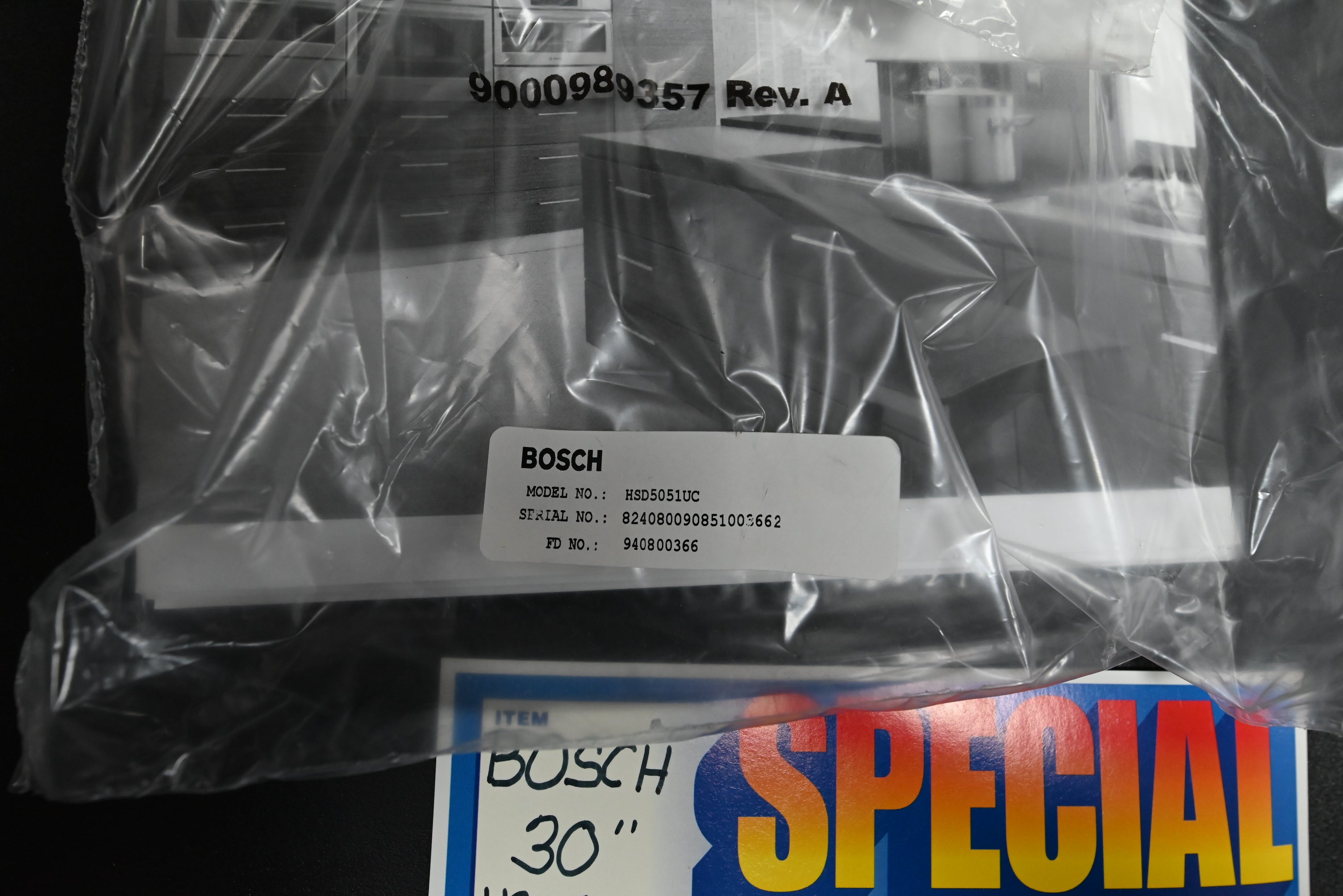 Bosch 30 drawer stacked vertically under wall oven showing seamless flush profile