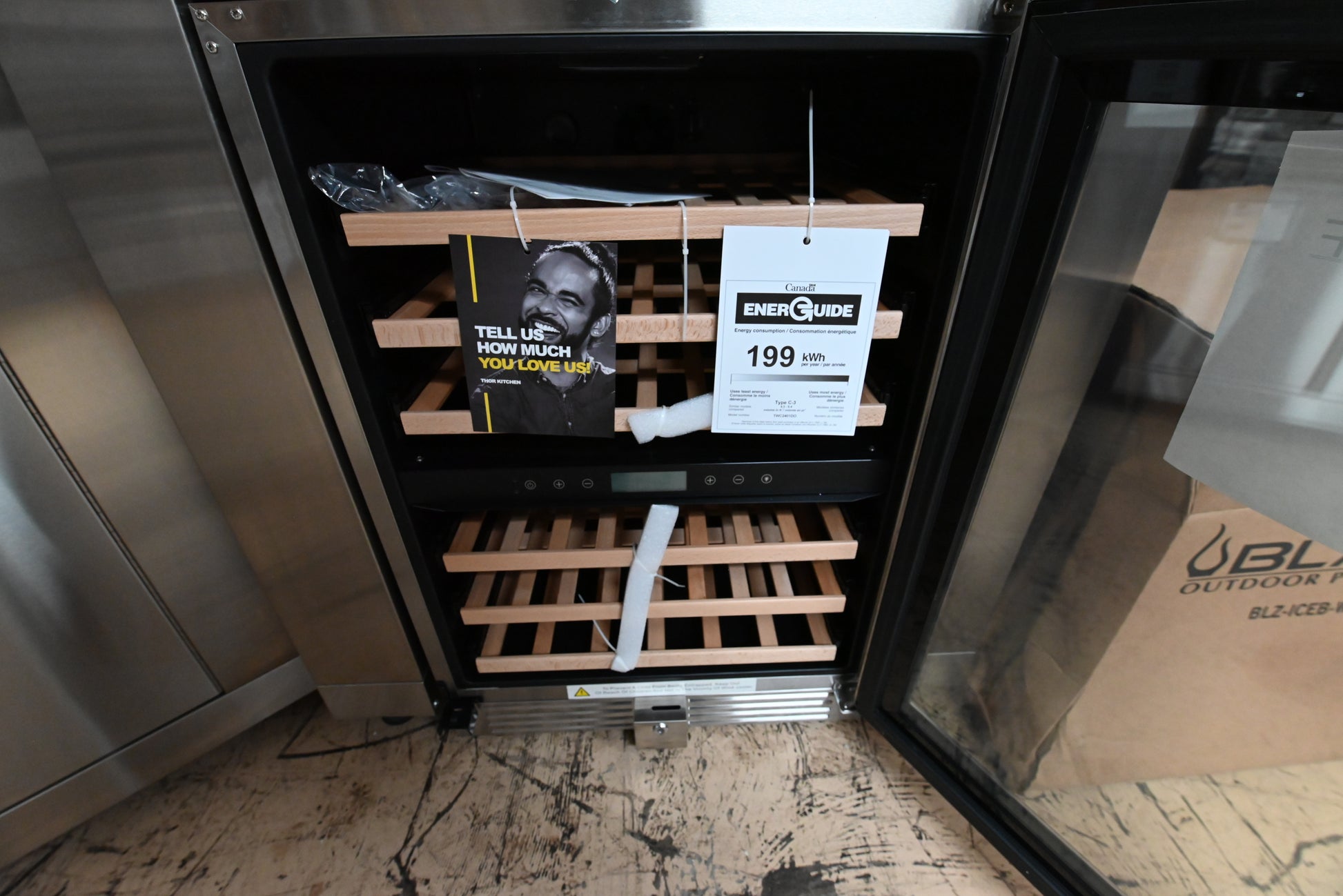 Under-counter dual-zone glass door drink and wine refrigerator in stainless steel