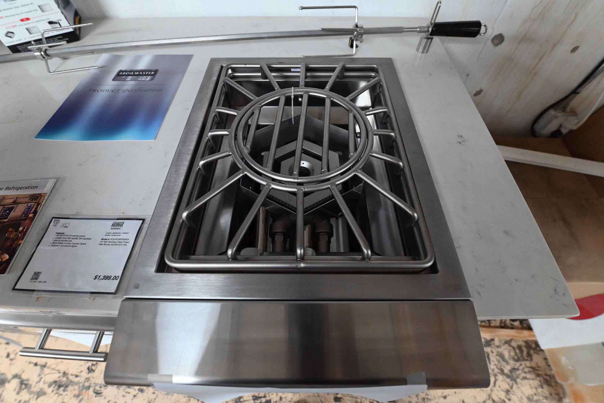 XO Appliance 16 power burner close up showing blue LED control accent light and wok ring center