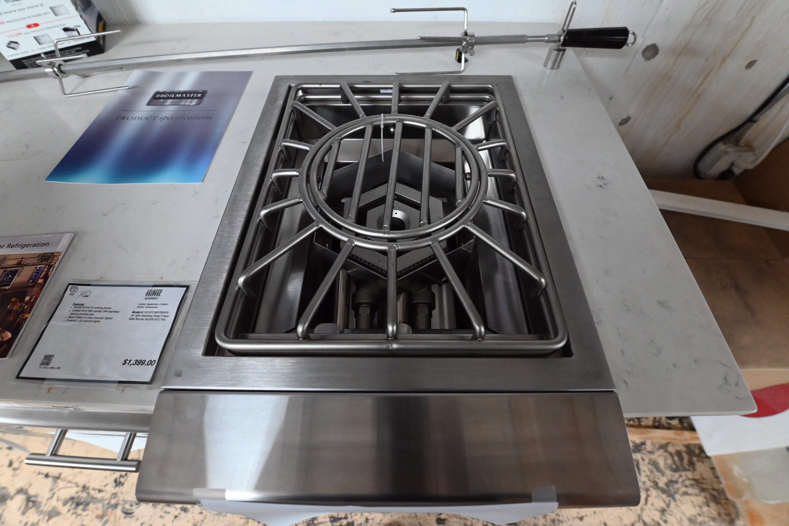 XO Appliance 16 power burner close up showing blue LED control accent light and wok ring center