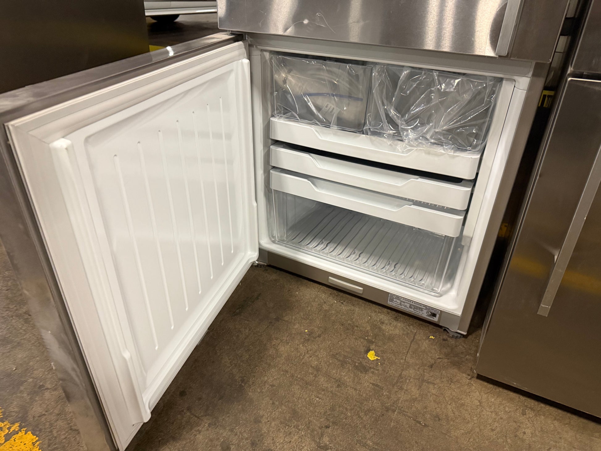 Fisher & Paykel RF135BDLUX4N 25" Stainless Steel Counter Depth Bottom Freezer Refrigerator