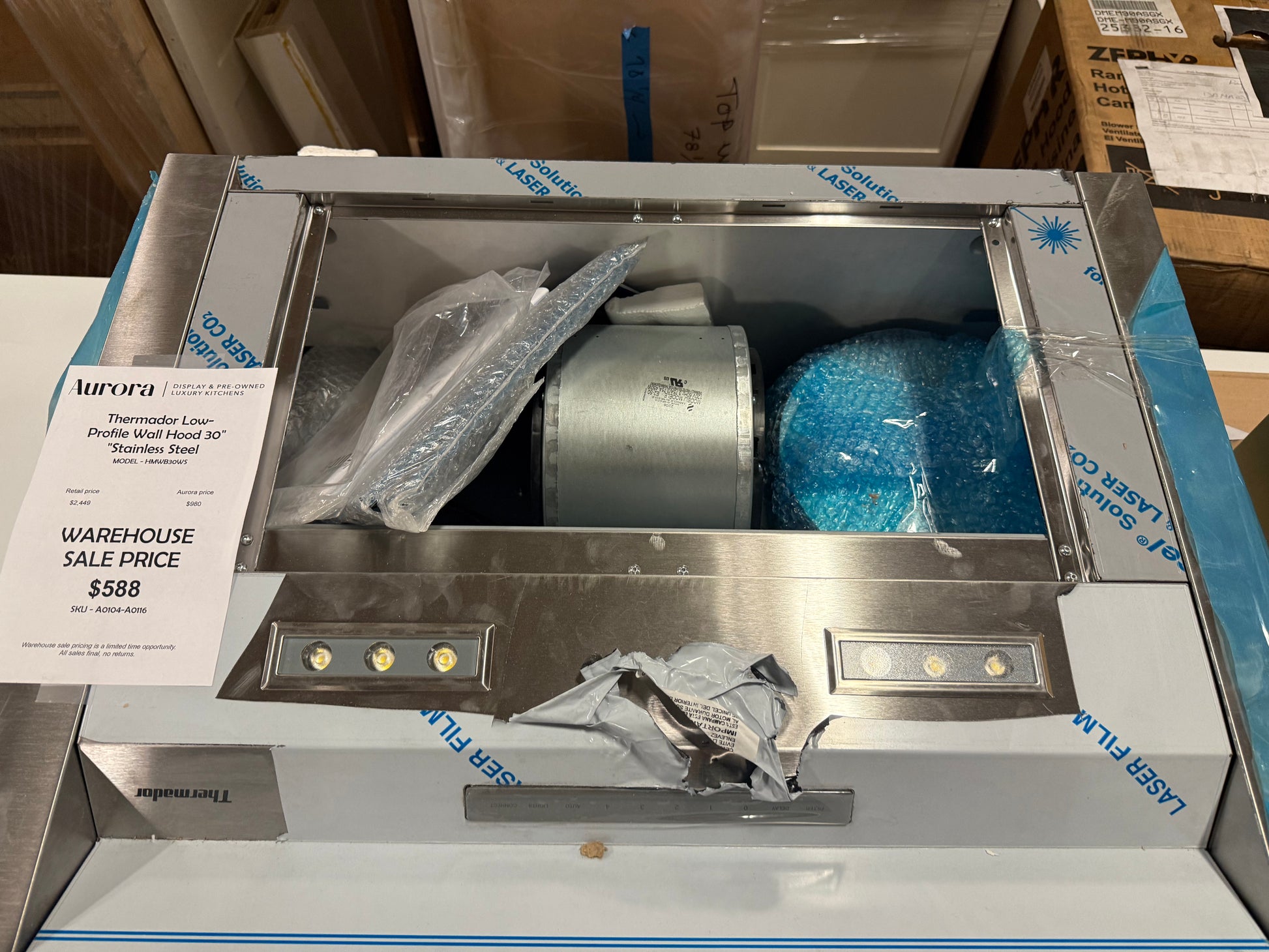 Thermador chimney hood with dishwasher-safe stainless steel baffle filters