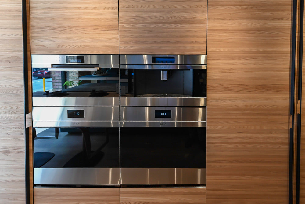 Valcucine Venture: Green Tea Glass Modern Kitchen with Island & Luxe Appliances