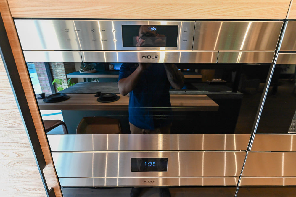 Valcucine Venture: Green Tea Glass Modern Kitchen with Island & Luxe Appliances