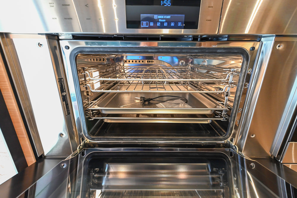 Valcucine Venture: Green Tea Glass Modern Kitchen with Island & Luxe Appliances