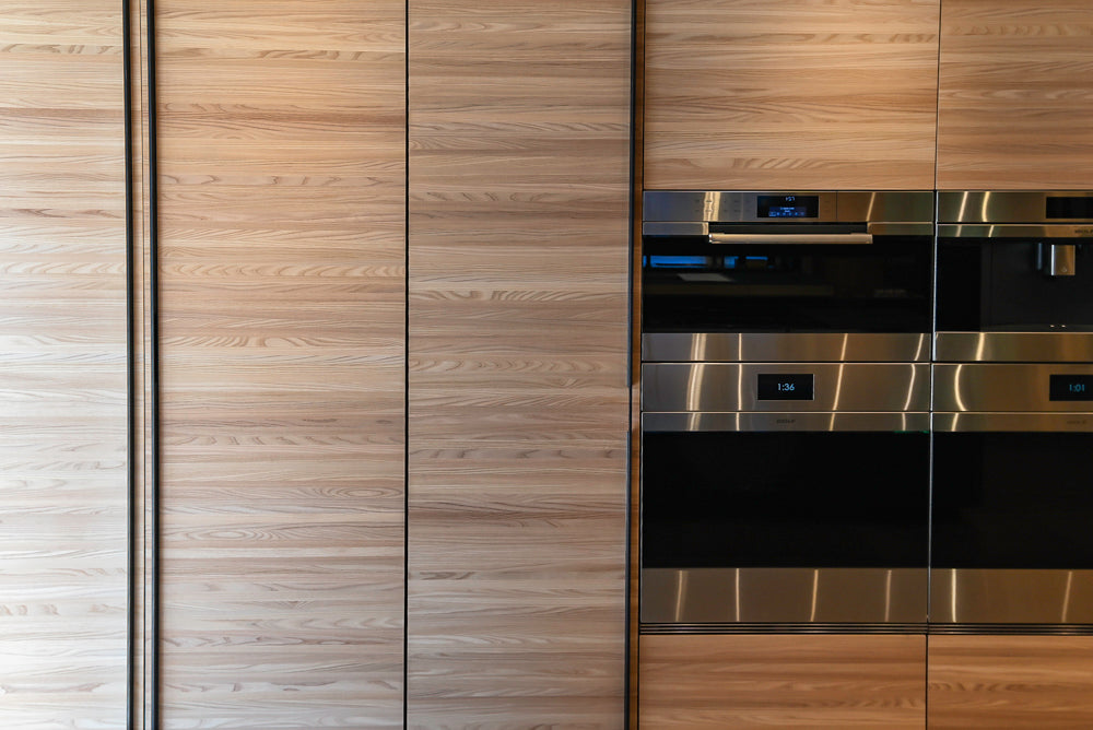 Valcucine Venture: Green Tea Glass Modern Kitchen with Island & Luxe Appliances