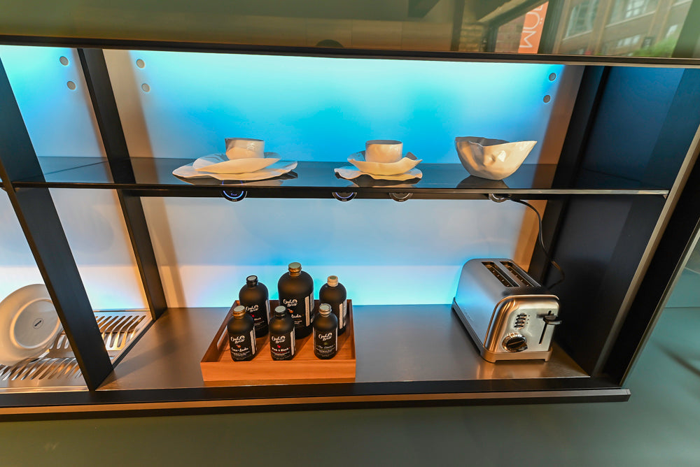 Valcucine Venture: Green Tea Glass Modern Kitchen with Island & Luxe Appliances