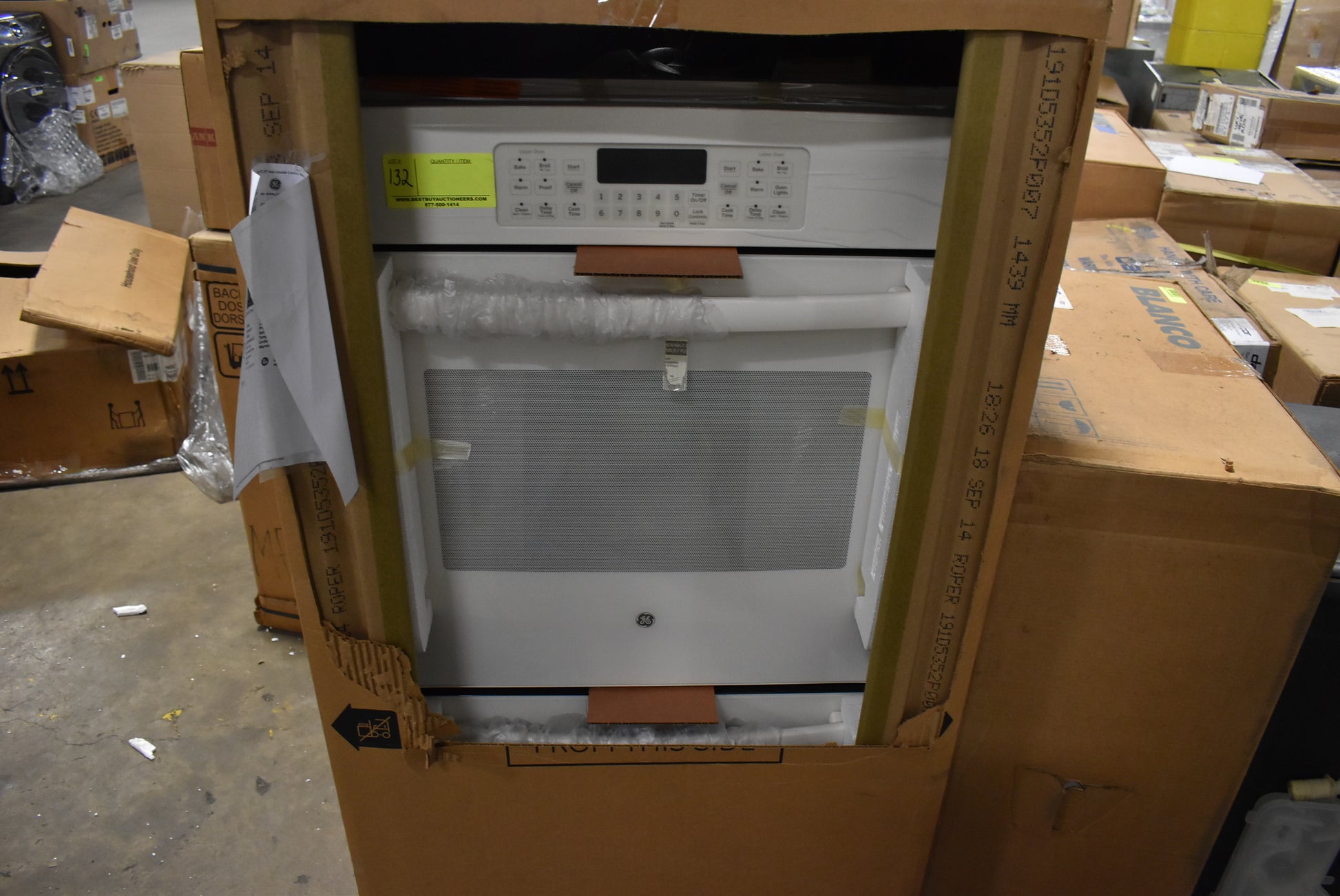 Luxury 27 inch built-in GE oven for kitchen renovations in bisque finish