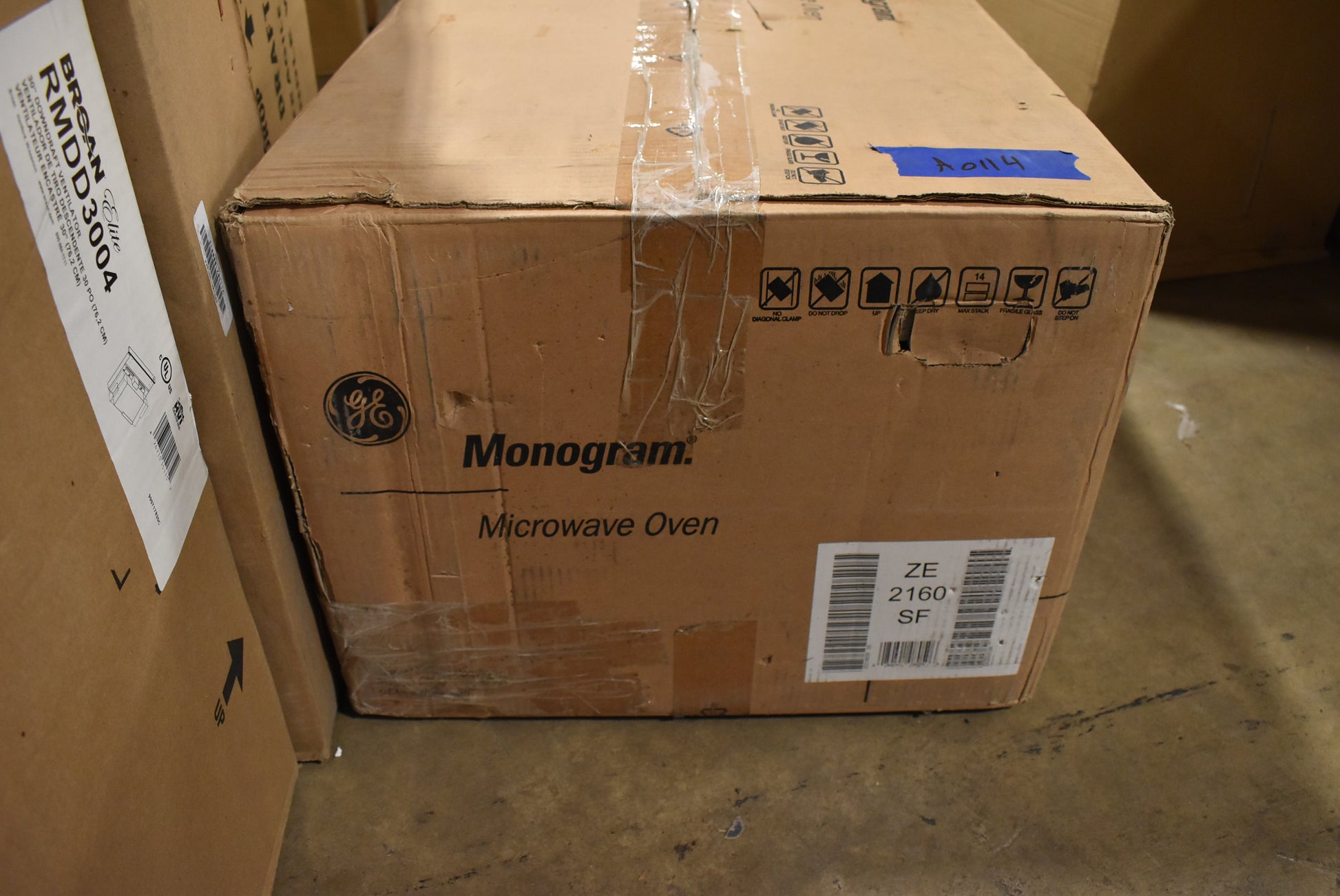 Monogram 1.1 cubic foot stainless steel countertop microwave