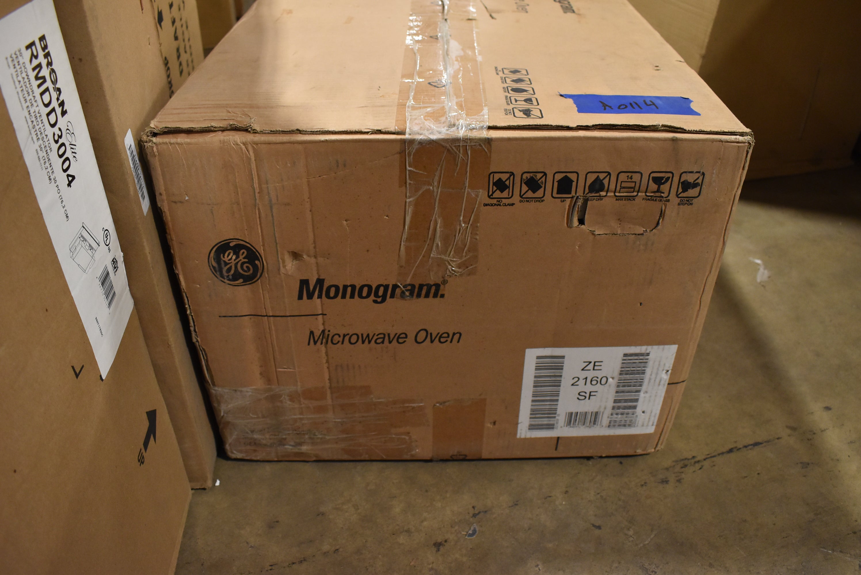 Monogram 1.1 cubic foot stainless steel countertop microwave