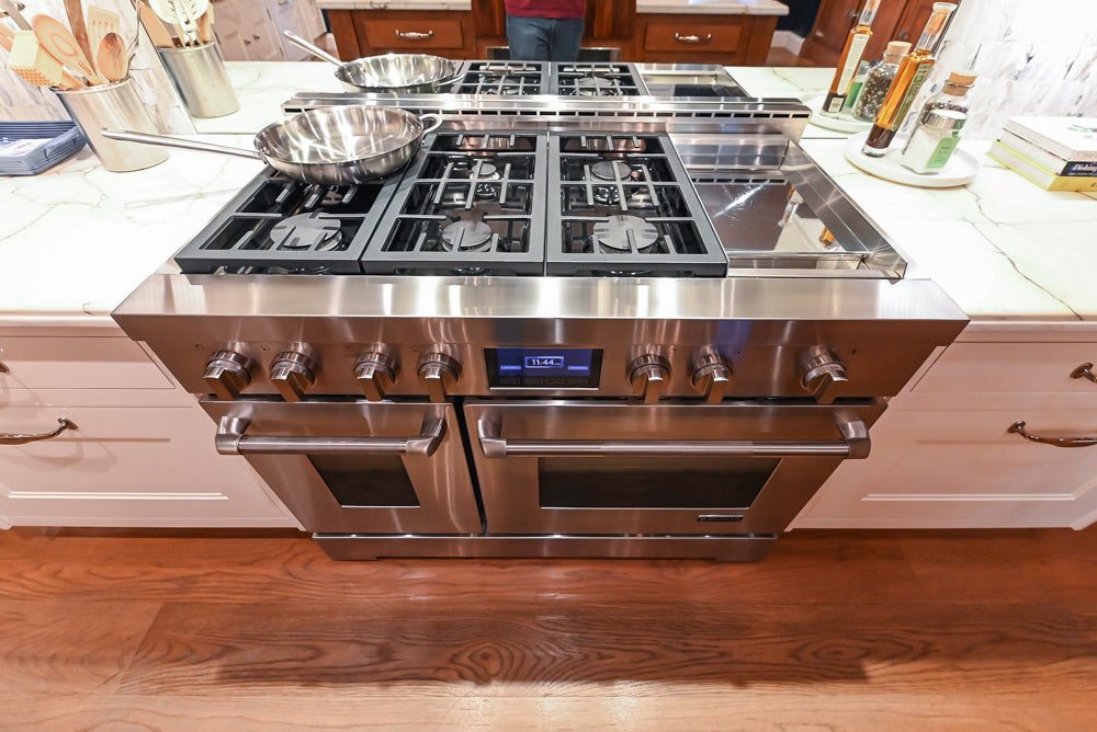 Christopher Peacock Refectory White Kitchen with Wooden Island, Marble Countertops and JennAir Appliances