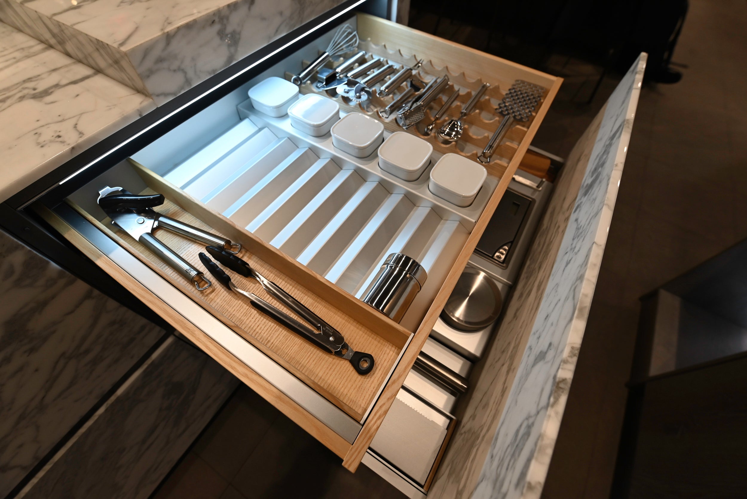 eggersmann USA Chablis Vintage Oak & Steel Grey Modern Kitchen with Arabescato Waterfall Island and Miele Appliance Suite